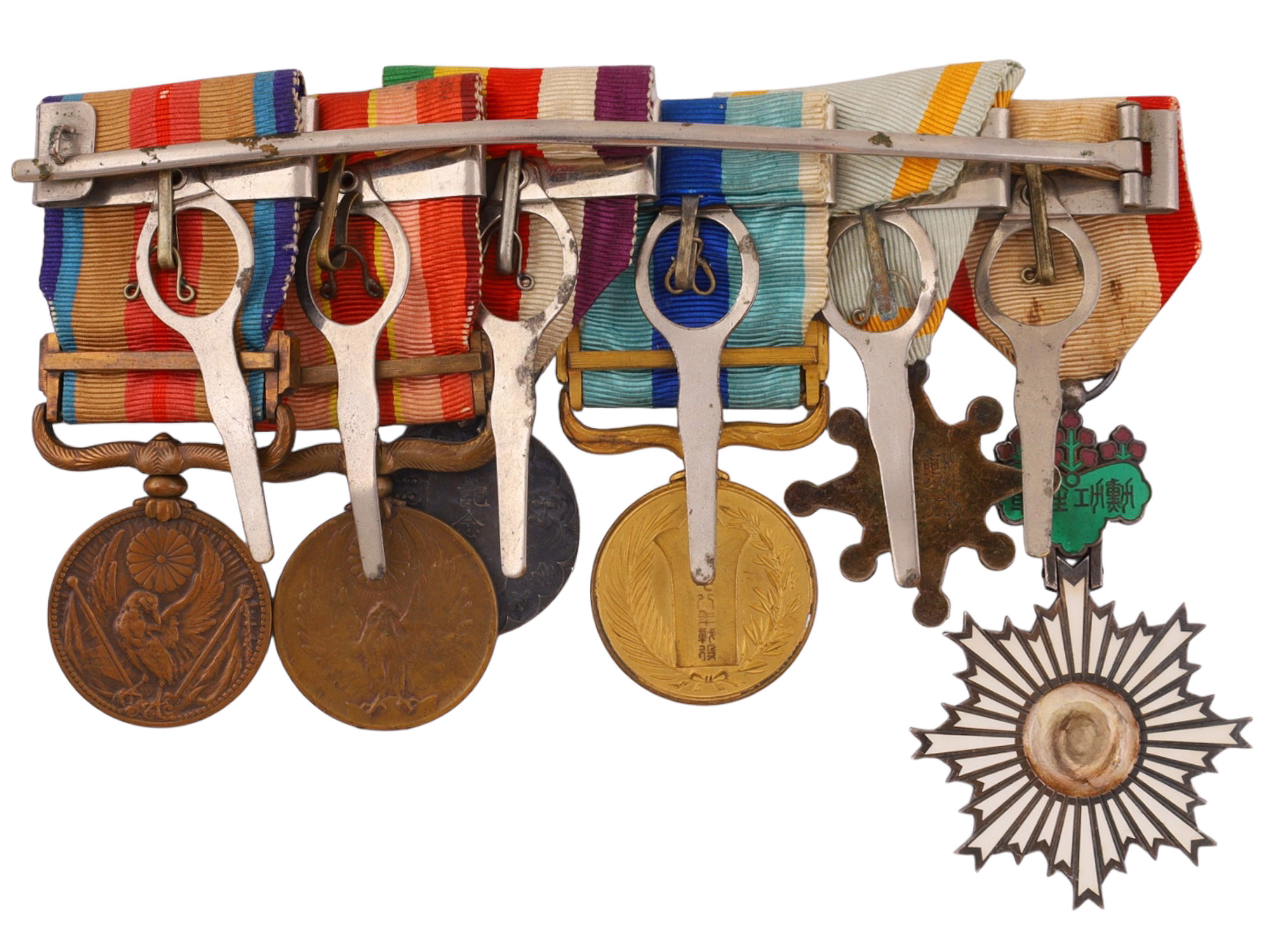 A JAPANESE MEDAL BAR WITH SIX DECORATIONS, SHOWA PERIOD