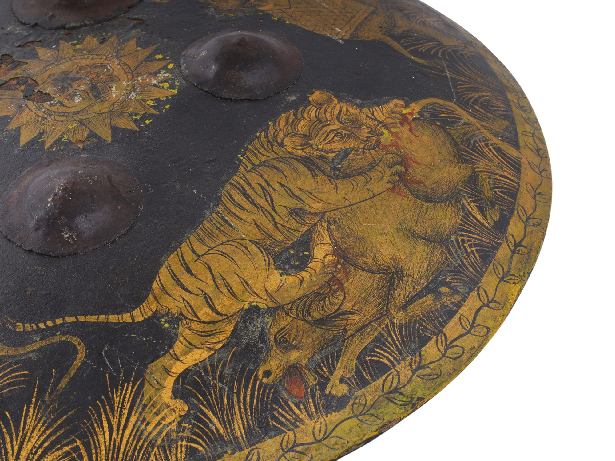 AN INDIAN PAINTED AND GILT HIDE DHAL SHIELD, LATE 19TH CENTURY