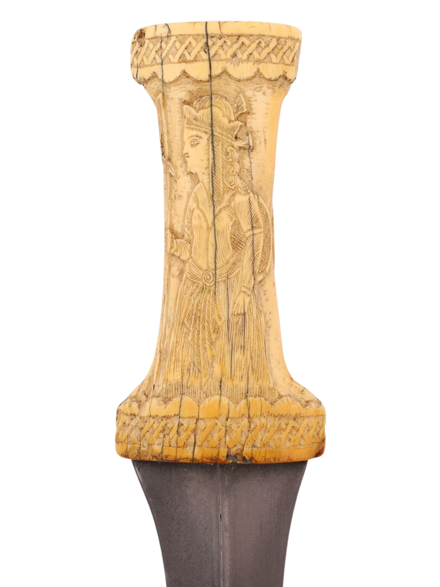 A QAJAR PERSIAN JAMBIYA WITH WOOTZ BLADE AND CARVED BONE GRIP, 19TH CENTURY