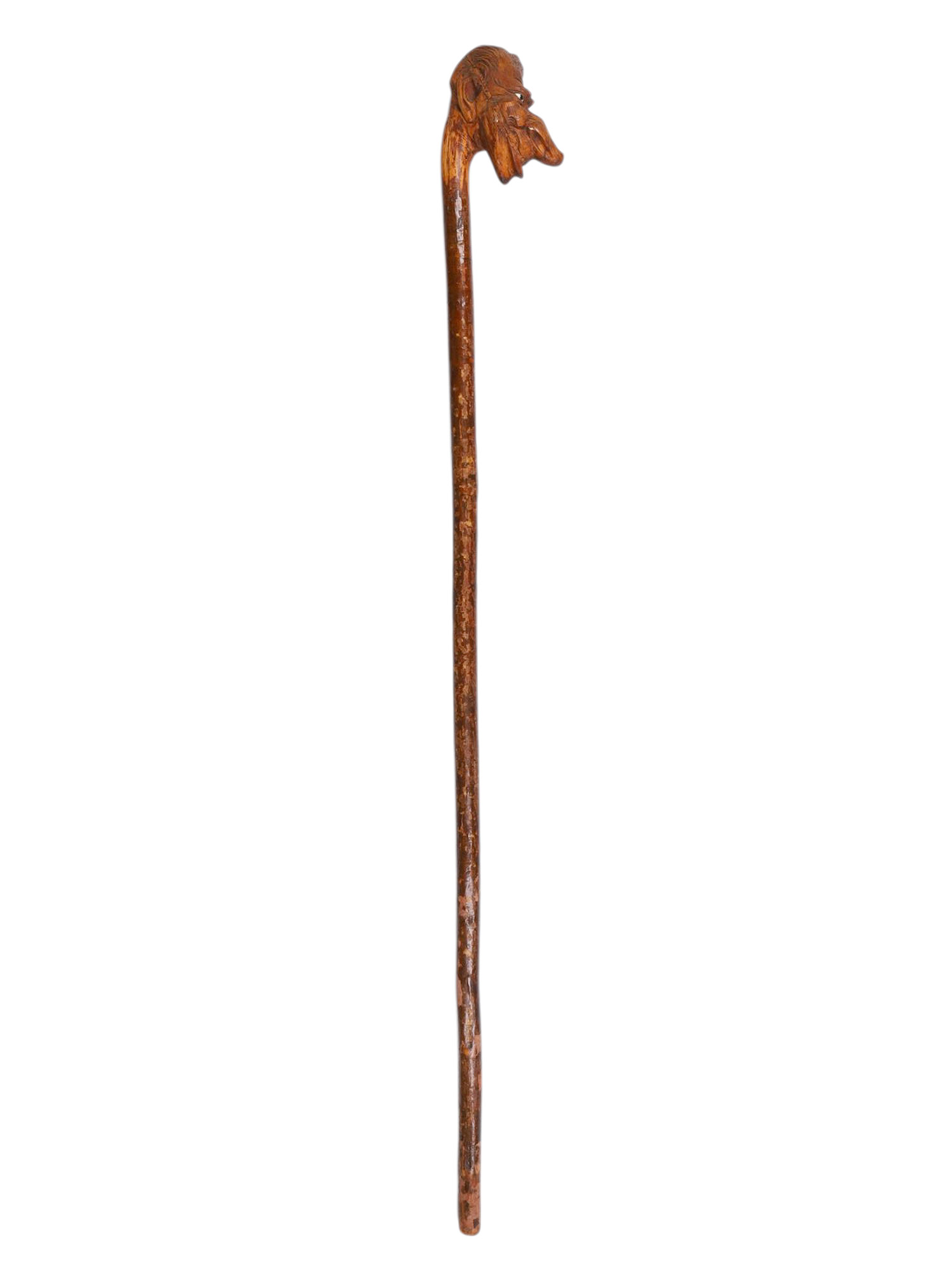 A LARGE CARVED WOOD WALKING STICK WITH MYTHOLOGICAL MASKED HANDLE, LATE 19TH CENTURY