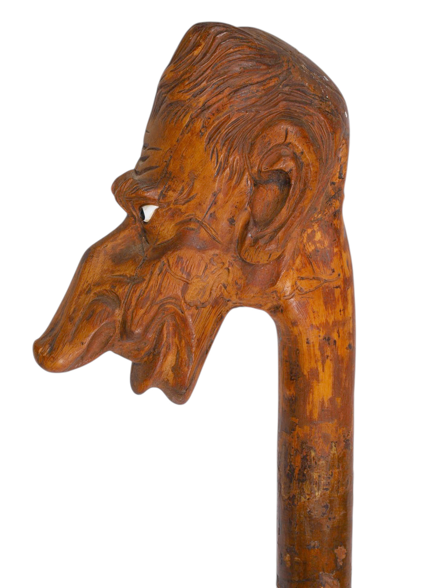 A LARGE CARVED WOOD WALKING STICK WITH MYTHOLOGICAL MASKED HANDLE, LATE 19TH CENTURY
