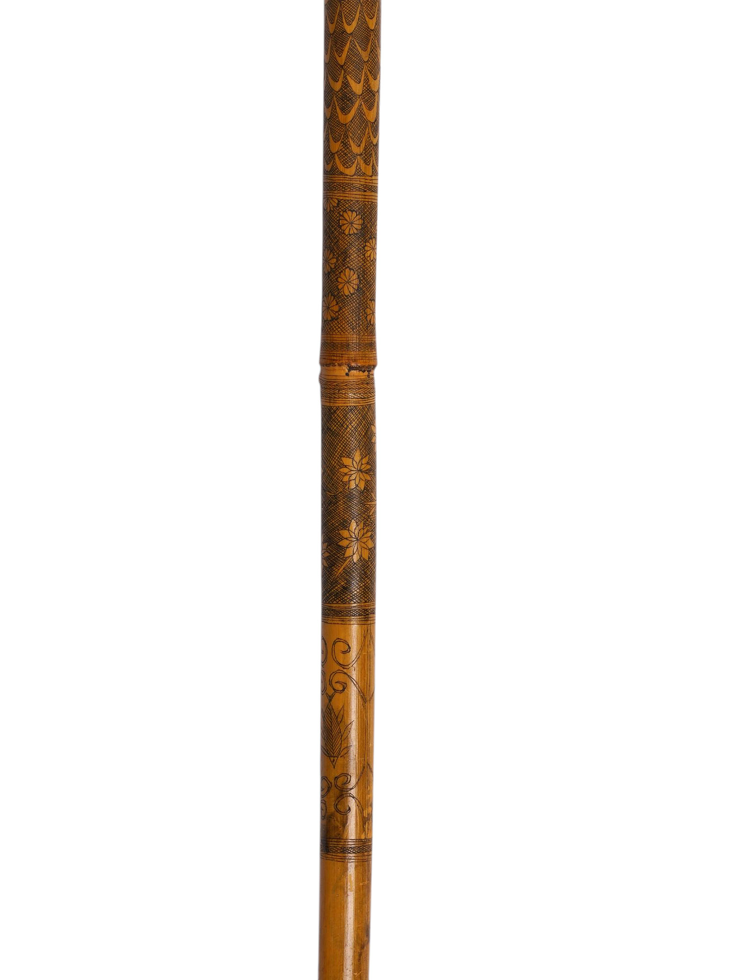 A JAPANESE ENGRAVED BAMBOO WALKING STICK OR CANE, 19TH CENTURY
