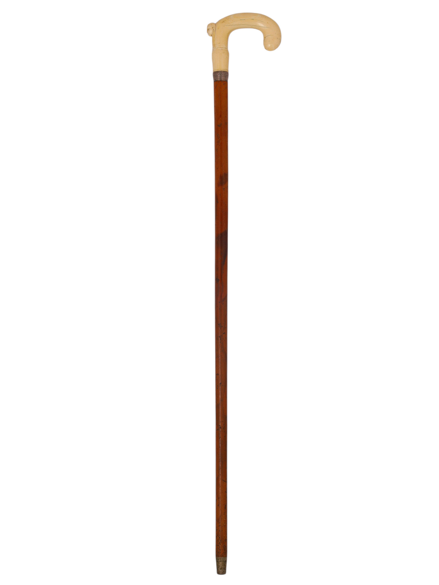 AN EGYPTIAN REVIVAL CARVED BONE-HANDLED WALKING CANE, LATE 19TH CENTURY