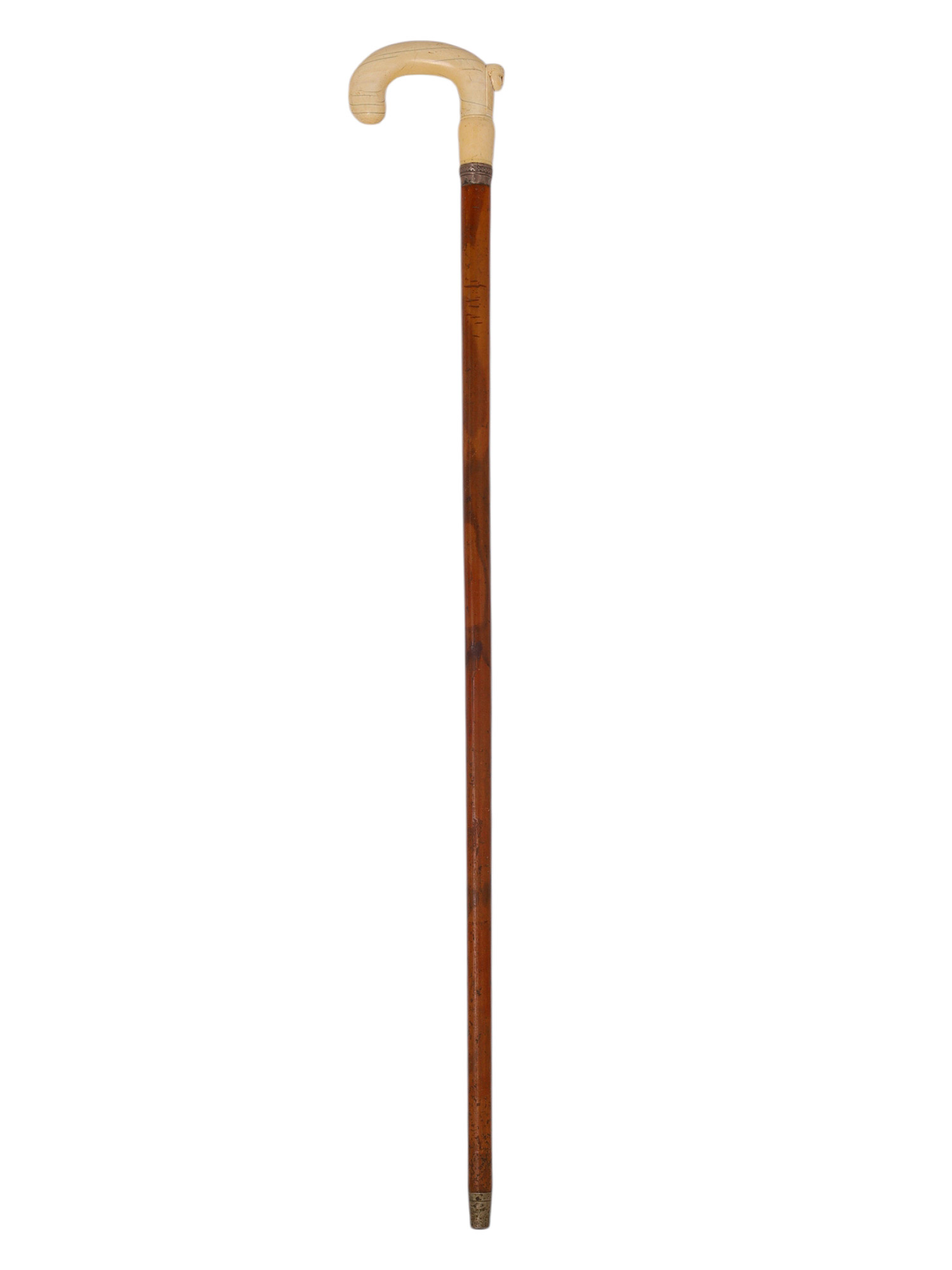 AN EGYPTIAN REVIVAL CARVED BONE-HANDLED WALKING CANE, LATE 19TH CENTURY