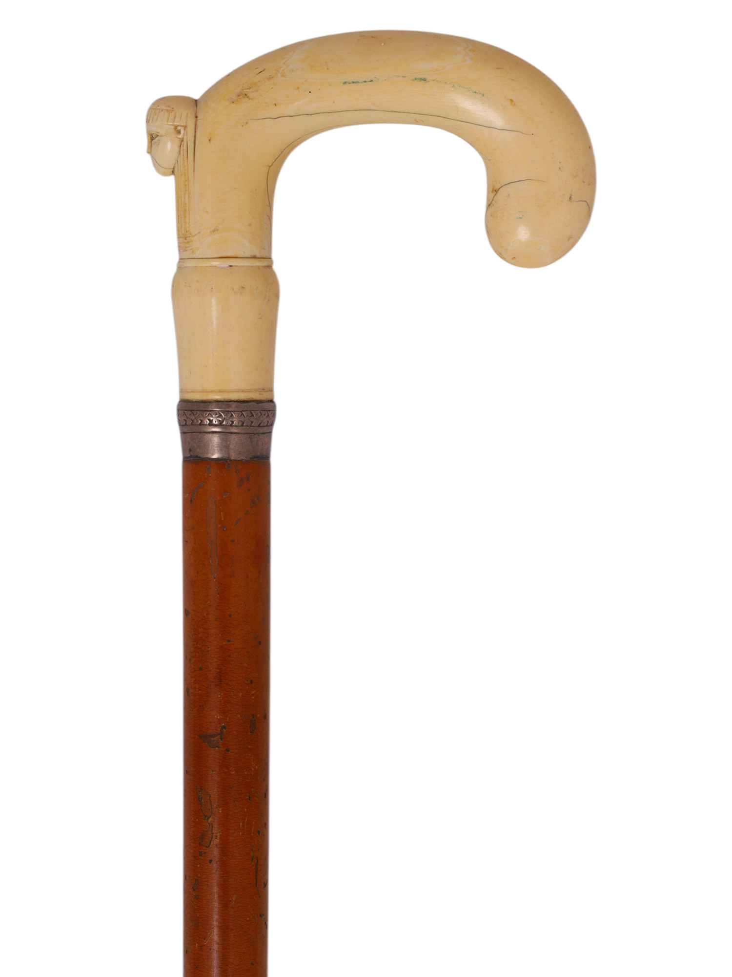 AN EGYPTIAN REVIVAL CARVED BONE-HANDLED WALKING CANE, LATE 19TH CENTURY
