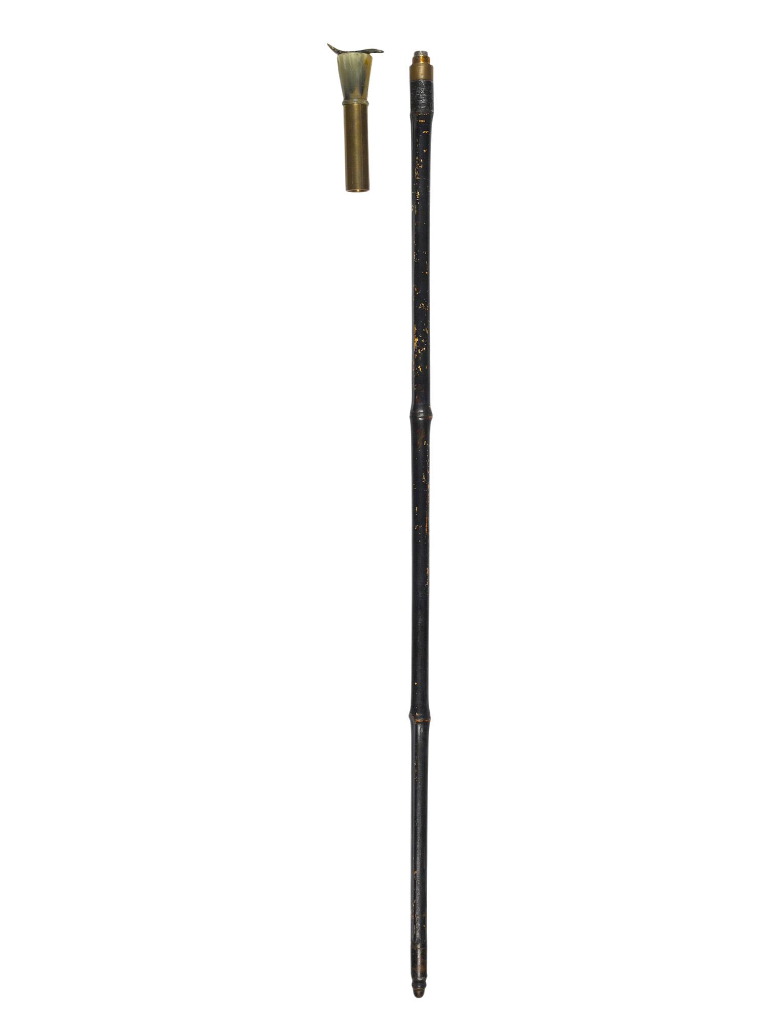 A CONTINENTAL EUROPEAN BRASS-MOUNTED HORN-HANDLED FIRING CANE, LATE 19TH CENTURY