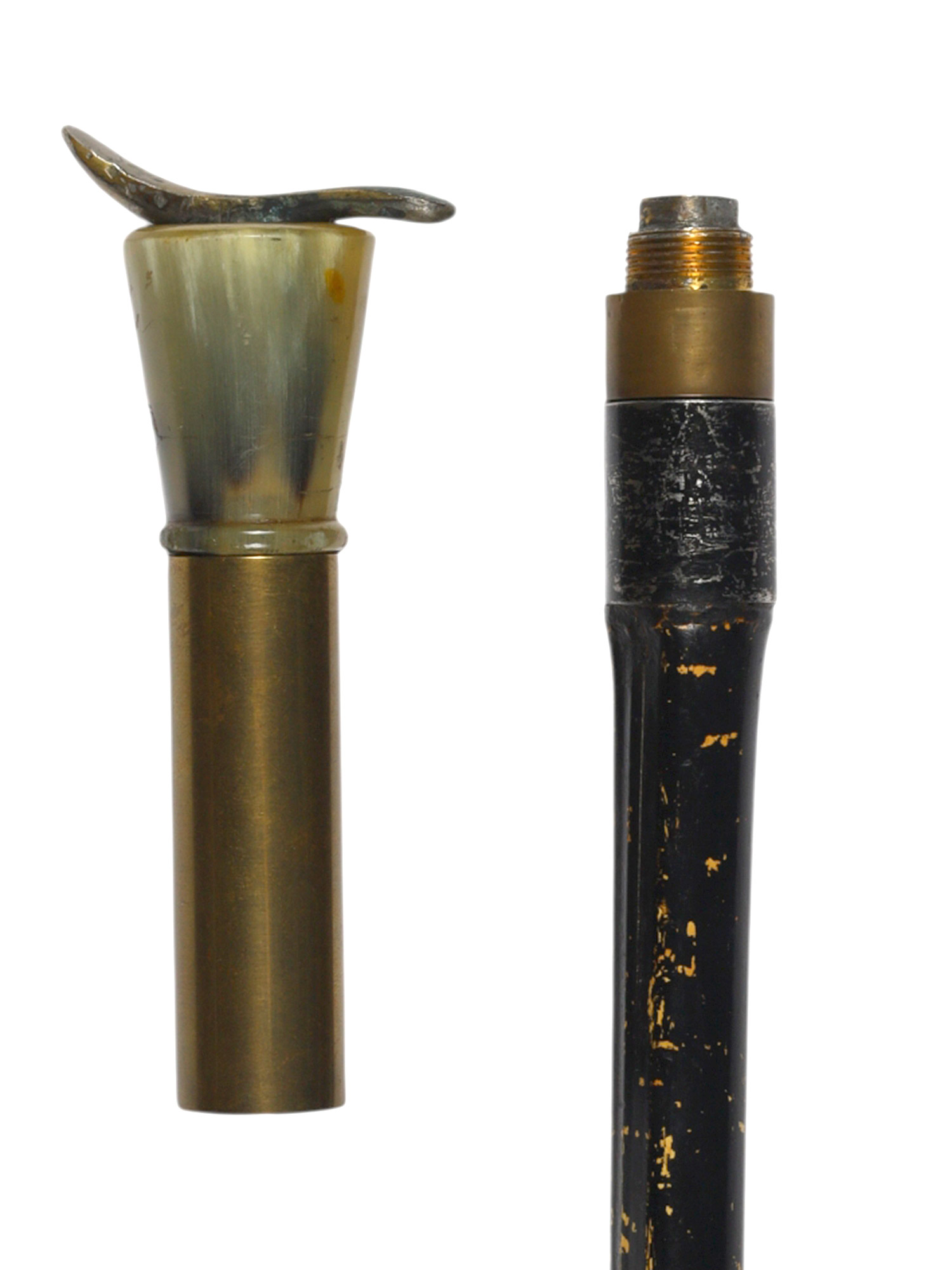 A CONTINENTAL EUROPEAN BRASS-MOUNTED HORN-HANDLED FIRING CANE, LATE 19TH CENTURY