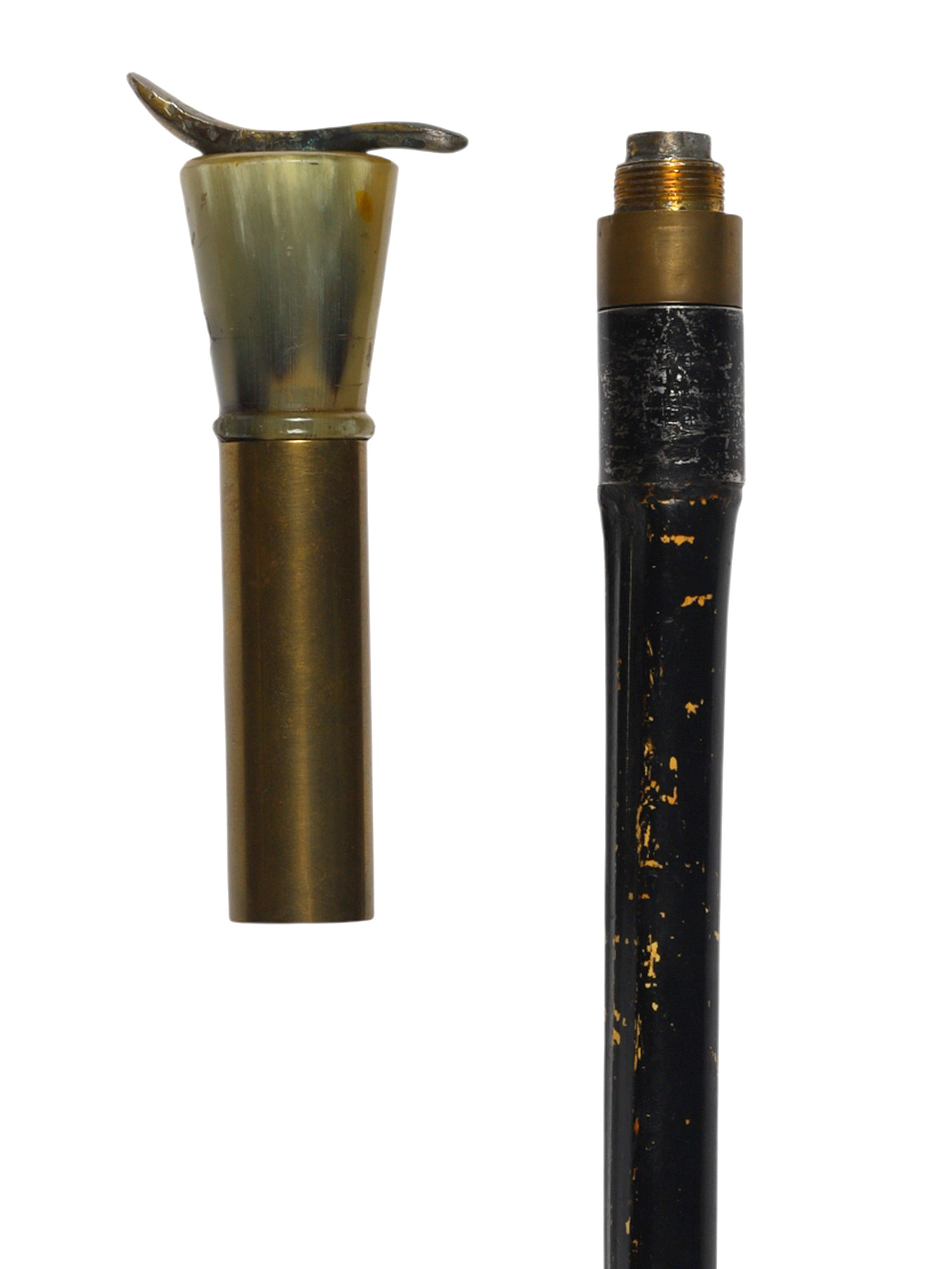 A CONTINENTAL EUROPEAN BRASS-MOUNTED HORN-HANDLED FIRING CANE, LATE 19TH CENTURY
