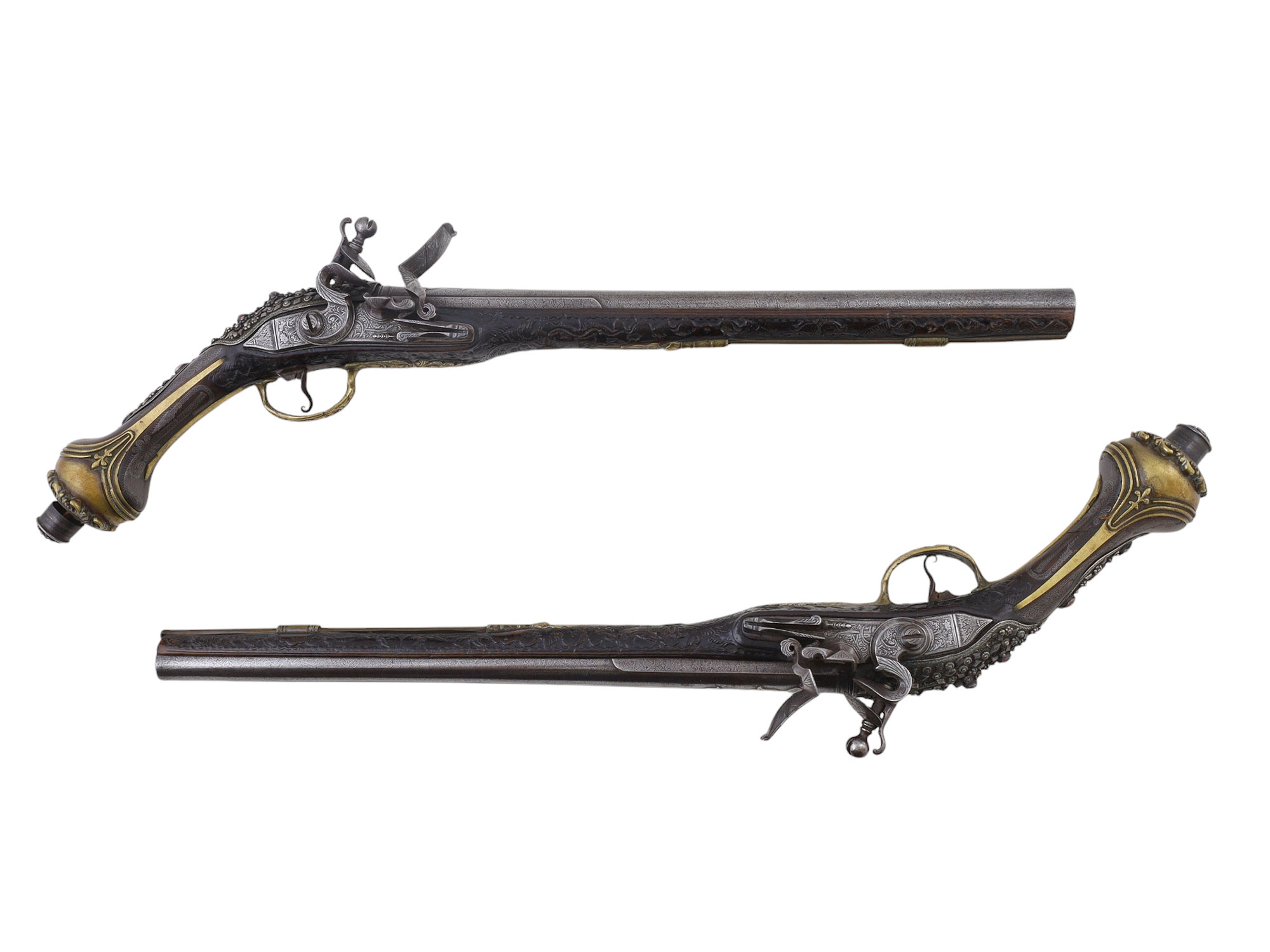 A PAIR OF MATCHED SILVER-MOUNTED DAMASCUS STEEL OTTOMAN FLINTLOCK PISTOLS, EARLY 19TH CENTURY
