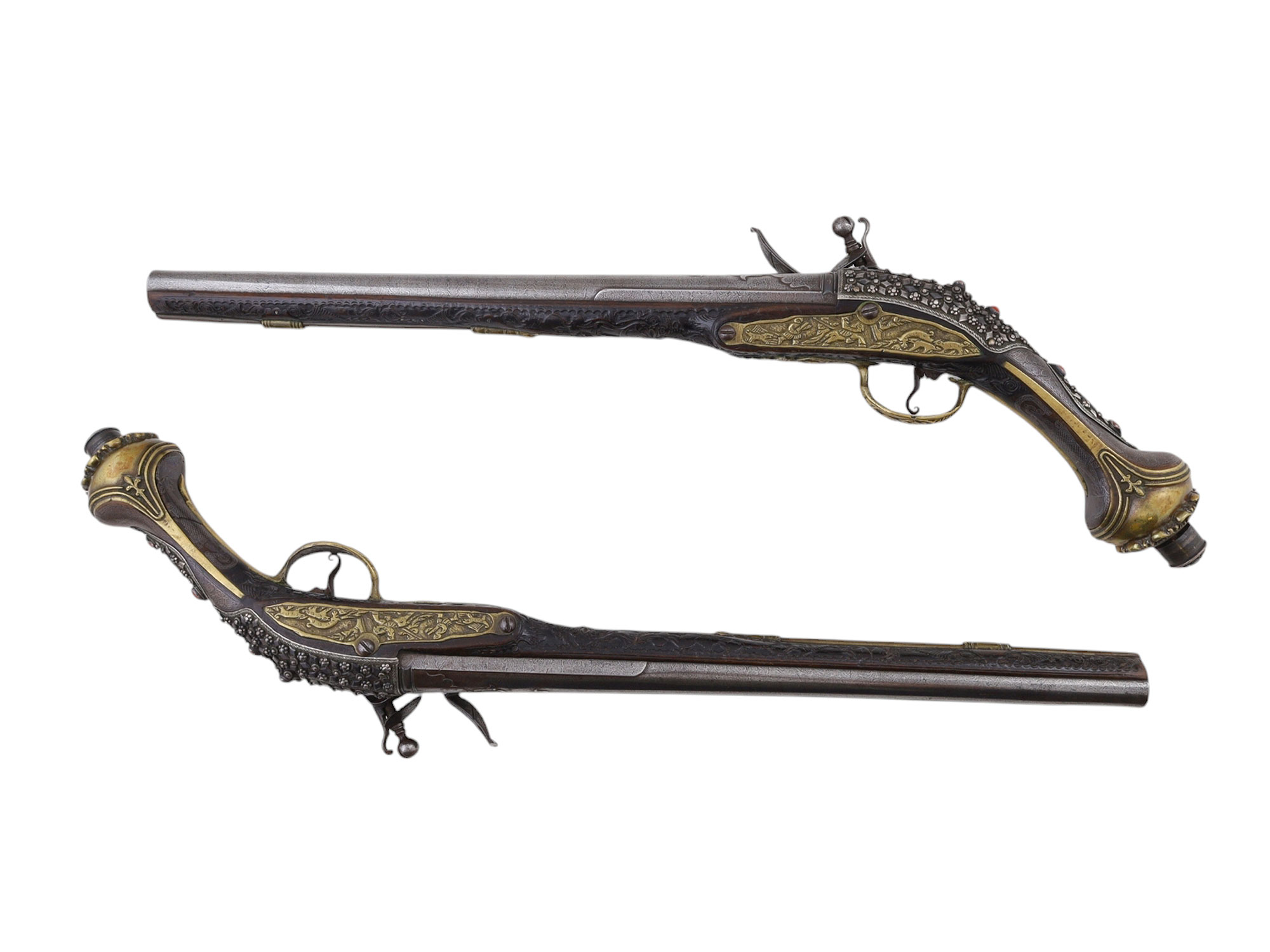 A PAIR OF MATCHED SILVER-MOUNTED DAMASCUS STEEL OTTOMAN FLINTLOCK PISTOLS, EARLY 19TH CENTURY