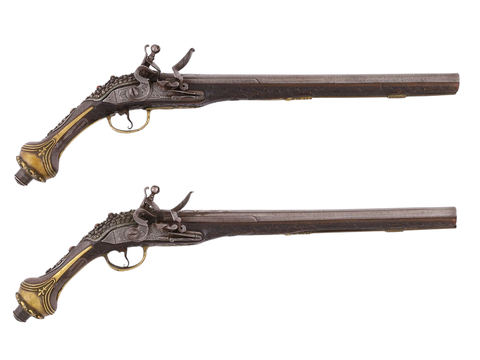A PAIR OF MATCHED SILVER-MOUNTED DAMASCUS STEEL OTTOMAN FLINTLOCK PISTOLS, EARLY 19TH CENTURY