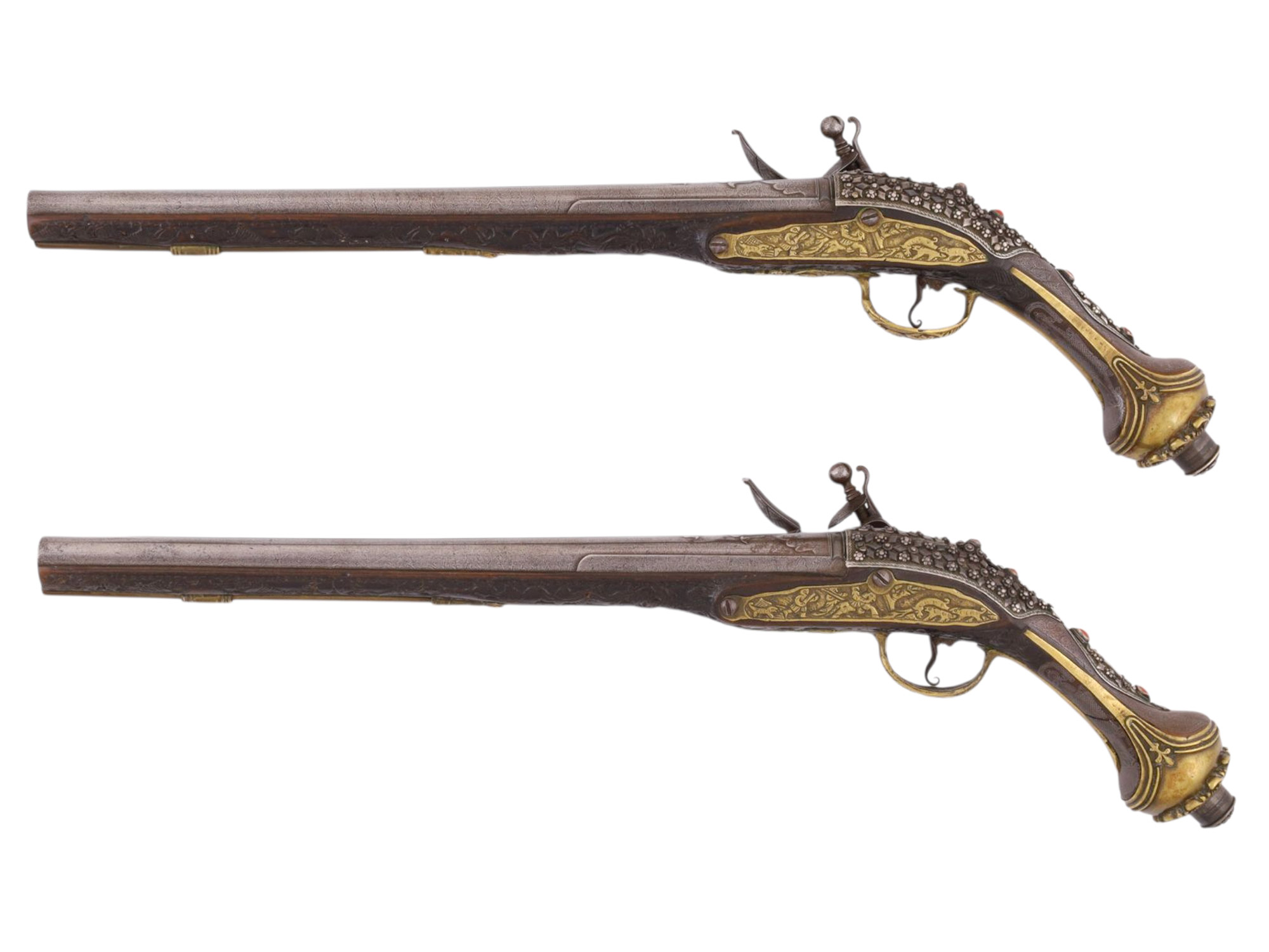 A PAIR OF MATCHED SILVER-MOUNTED DAMASCUS STEEL OTTOMAN FLINTLOCK PISTOLS, EARLY 19TH CENTURY