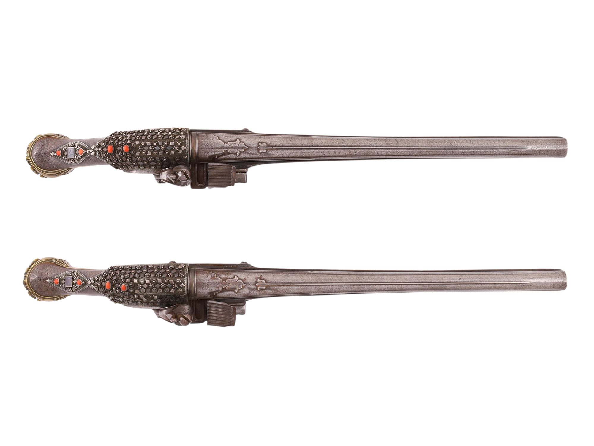 A PAIR OF MATCHED SILVER-MOUNTED DAMASCUS STEEL OTTOMAN FLINTLOCK PISTOLS, EARLY 19TH CENTURY