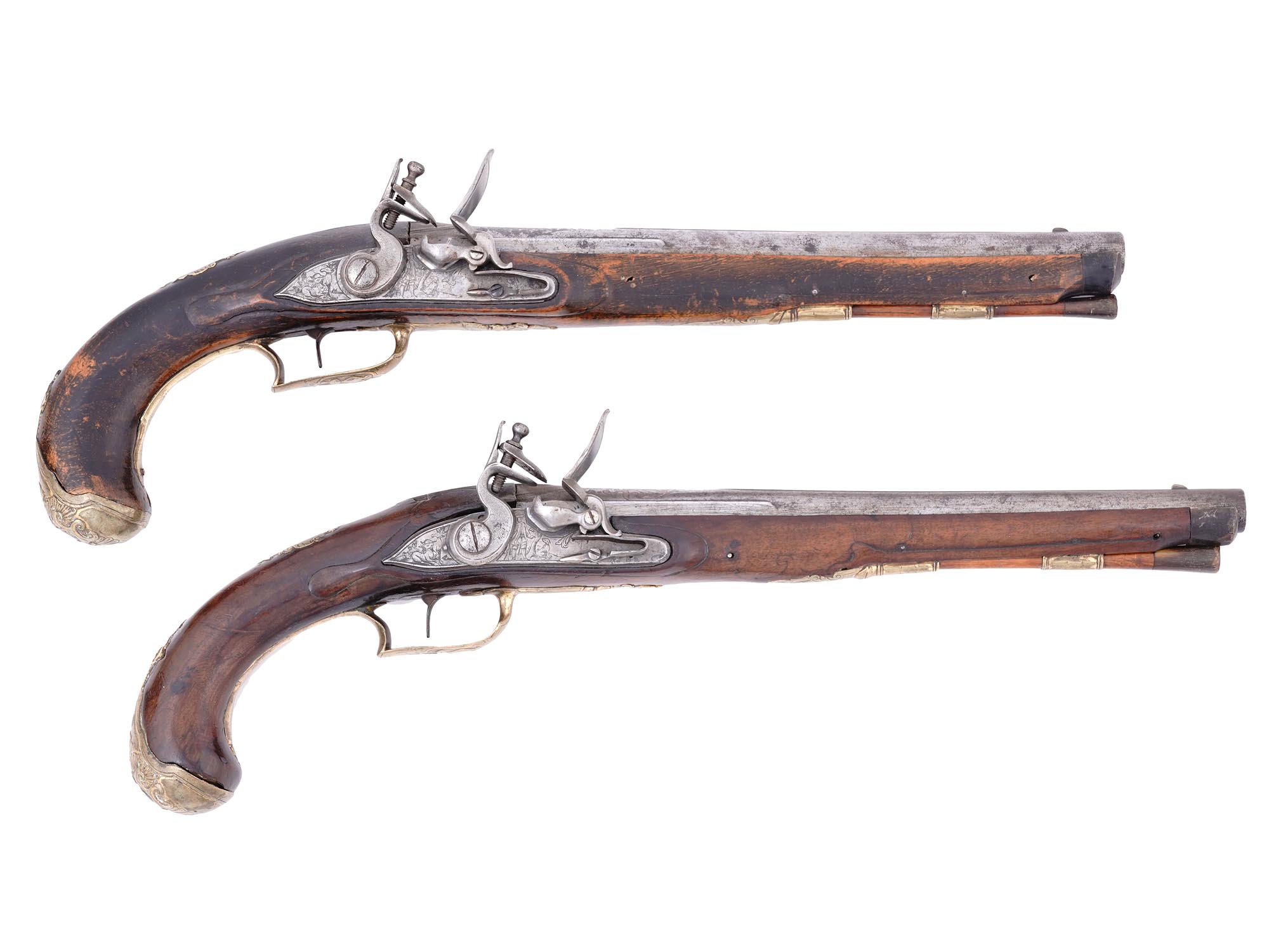 A MATCHED PAIR OF EUROPEAN FLINTLOCK PISTOLS, PROBABLY CENTRAL OR NORTHERN EUROPE, MID–LATE 18TH CENTURY