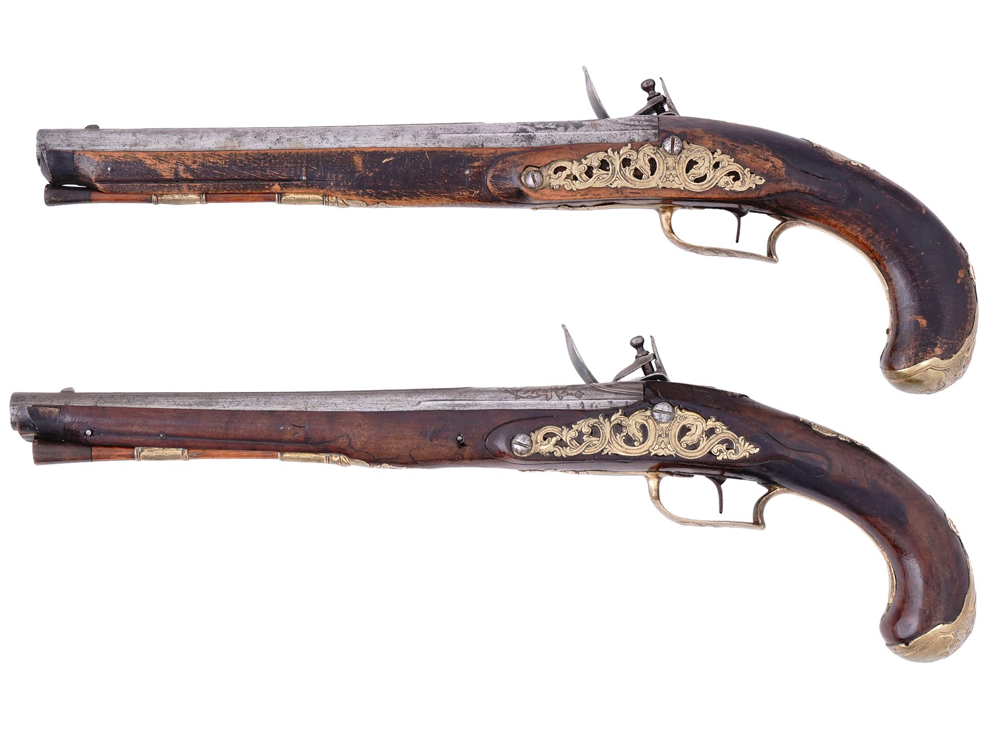 A MATCHED PAIR OF EUROPEAN FLINTLOCK PISTOLS, PROBABLY CENTRAL OR NORTHERN EUROPE, MID–LATE 18TH CENTURY