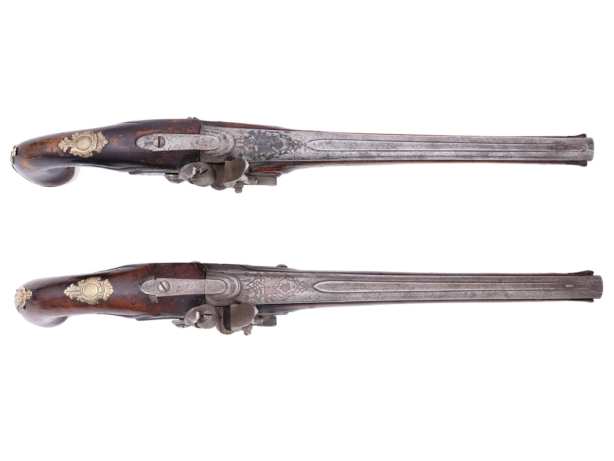 A MATCHED PAIR OF EUROPEAN FLINTLOCK PISTOLS, PROBABLY CENTRAL OR NORTHERN EUROPE, MID–LATE 18TH CENTURY