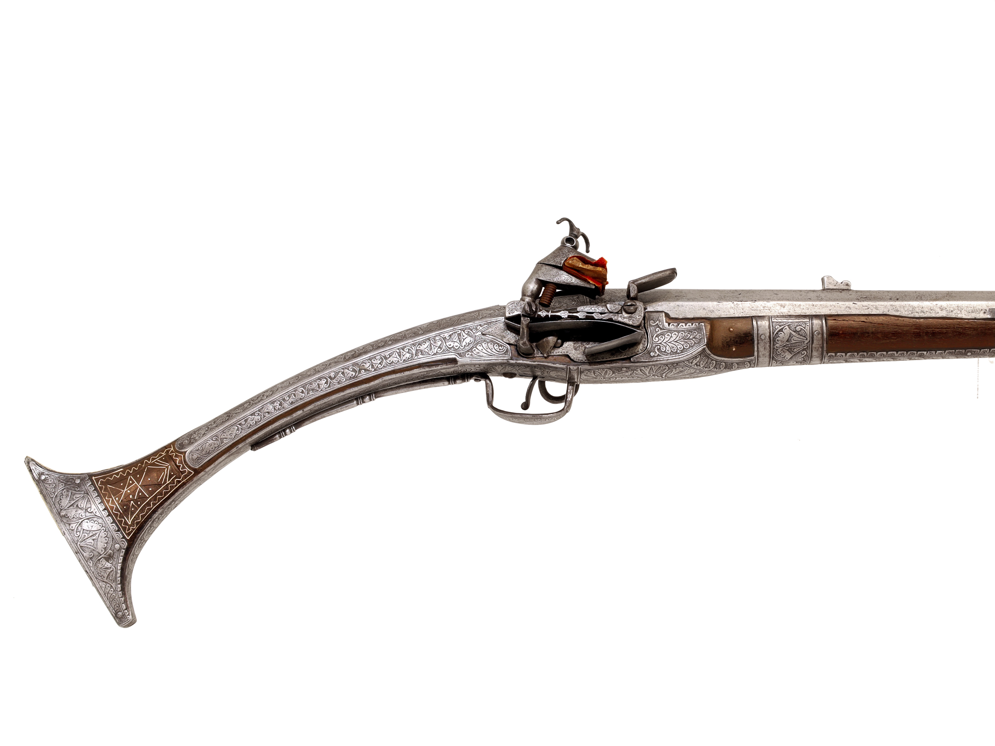 A BALKAN (PROBABLY ALBANIAN) 18-BORE MIQUELET-LOCK RIFLE (ARNAUTKA), EARLY 19TH CENTURY