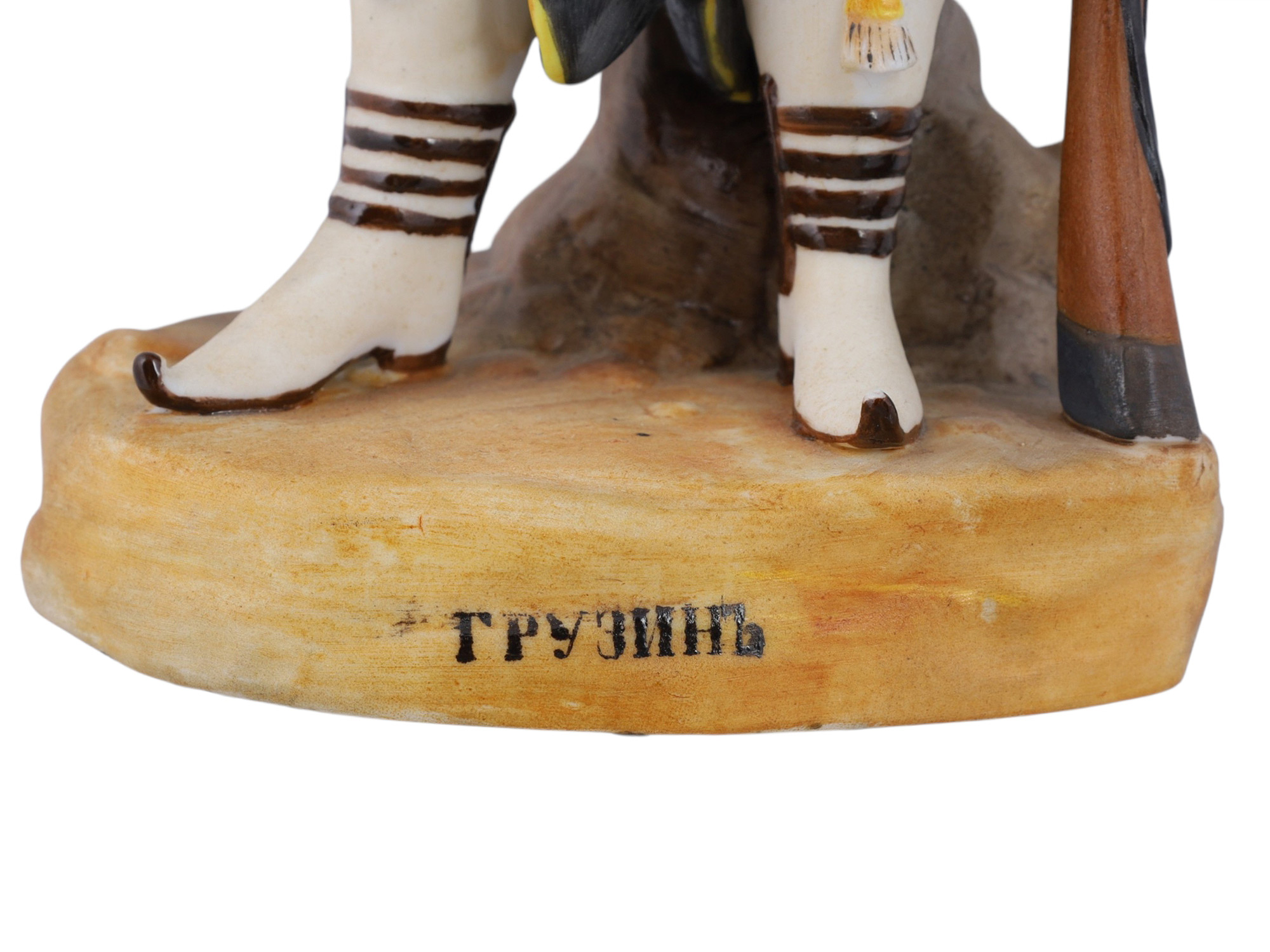A RUSSIAN GARDNER PORCELAIN FIGURE OF A GEORGIAN MAN, 19TH CENTURY