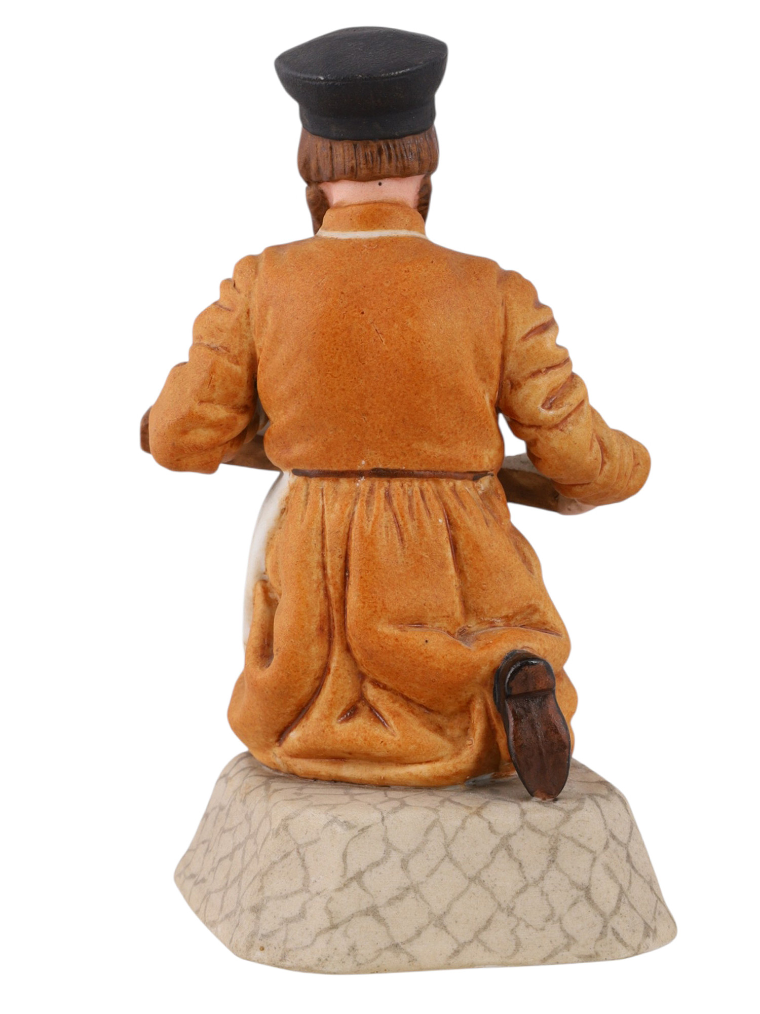 A RUSSIAN PORCELAIN FIGURE OF A FOOD VENDOR BY THE GARDNER PORCELAIN FACTORY, VERBILKI, LATE 19TH CENTURY