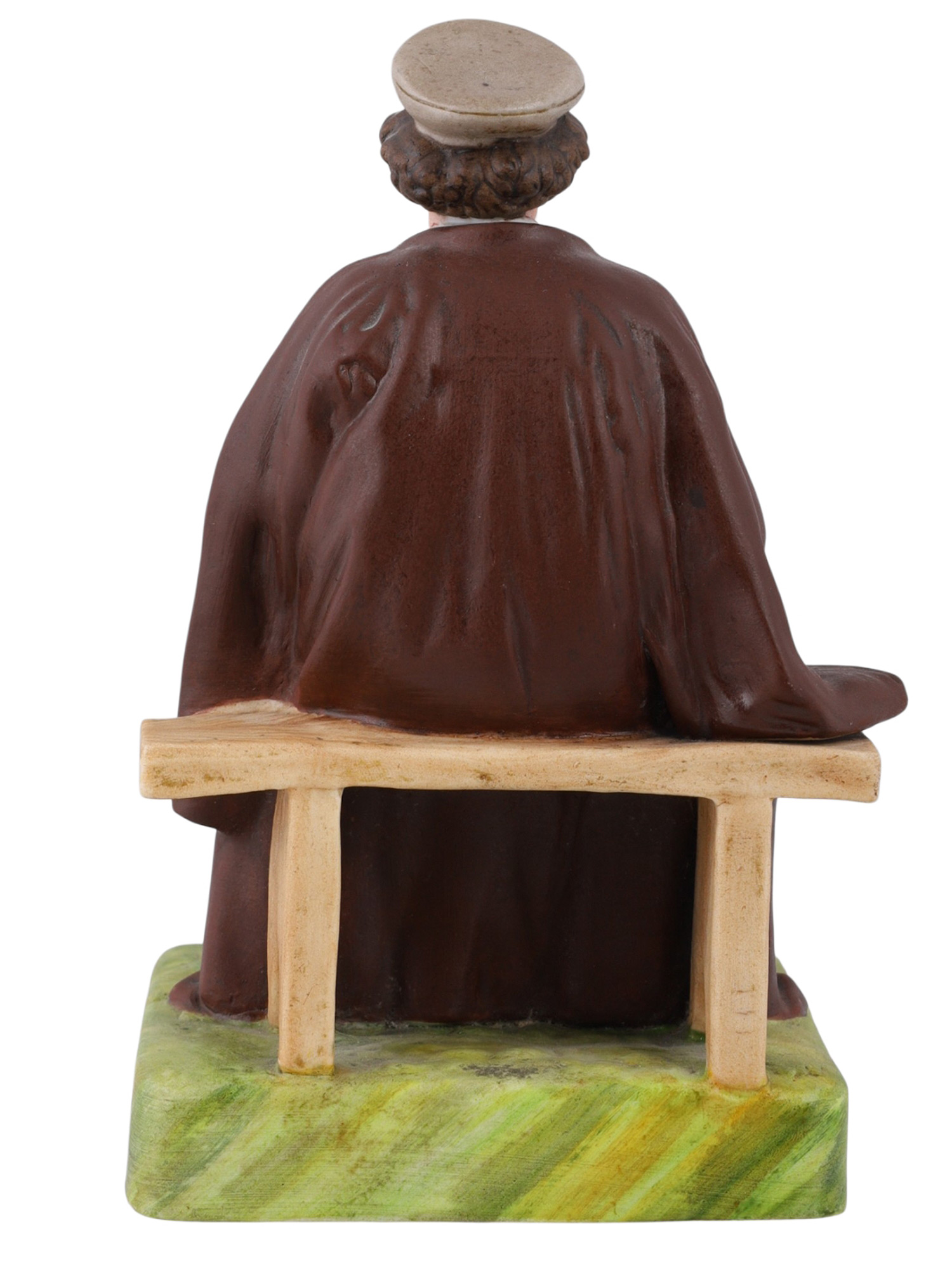 A RUSSIAN GARDNER PORCELAIN FIGURE OF AN ACCORDION PLAYER