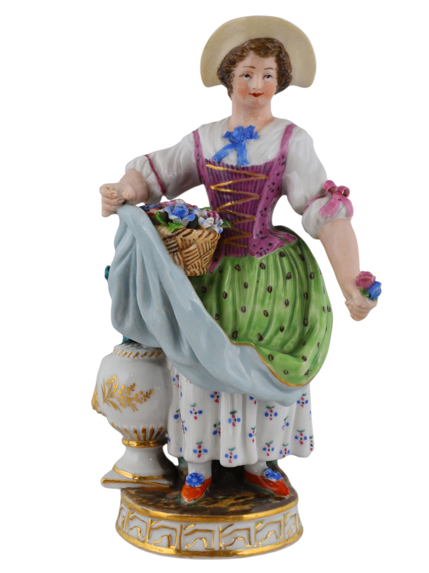 A RUSSIAN POPOV PORCELAIN FIGURE OF A WOMAN WITH FLOWERS