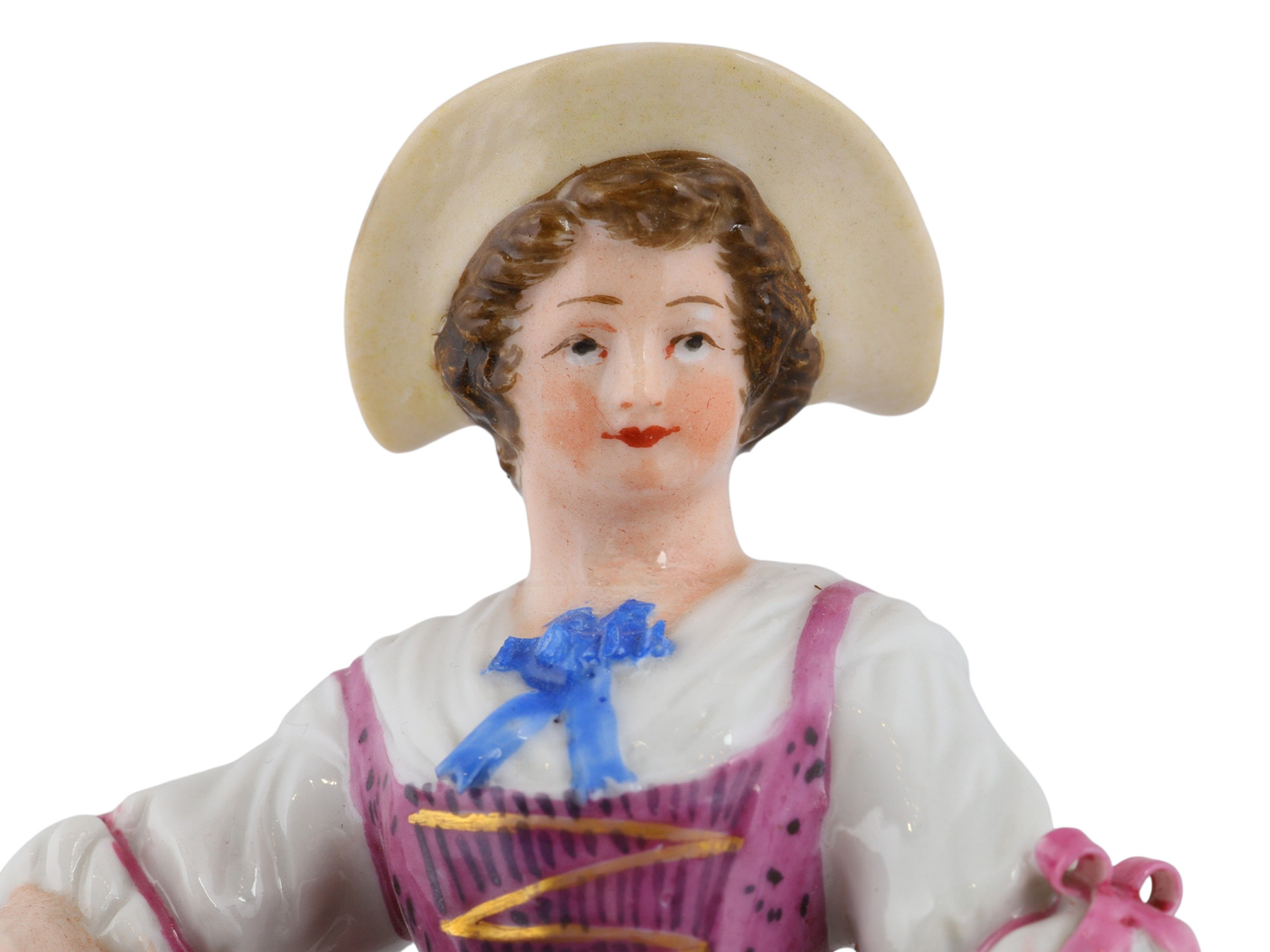 A RUSSIAN POPOV PORCELAIN FIGURE OF A WOMAN WITH FLOWERS
