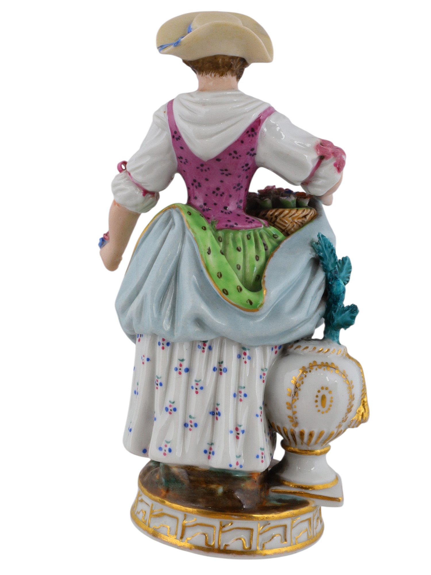 A RUSSIAN POPOV PORCELAIN FIGURE OF A WOMAN WITH FLOWERS