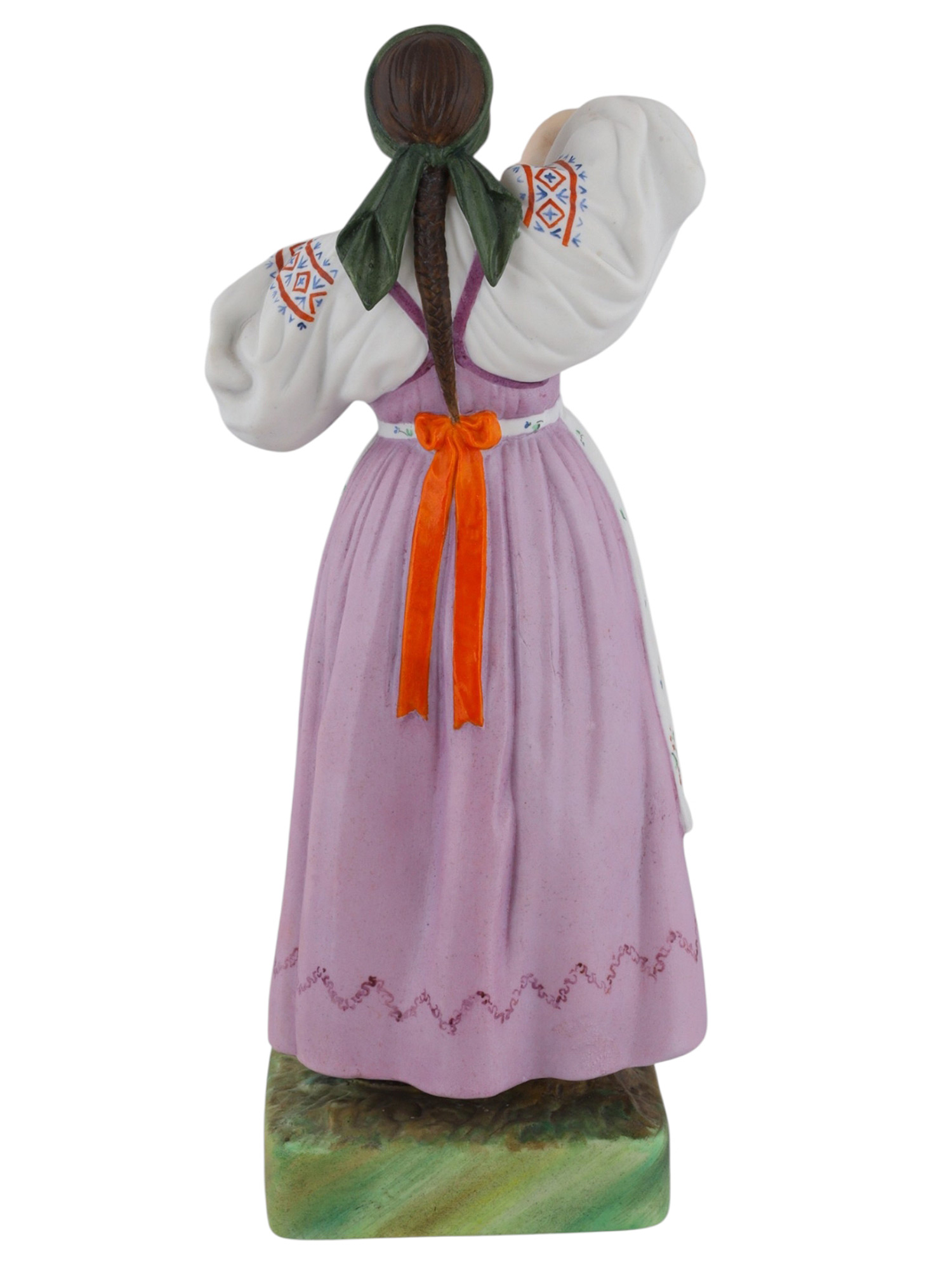 A RUSSIAN KUSNETSOV PORCELAIN FIGURE OF A WOMAN, 19TH CENTURY