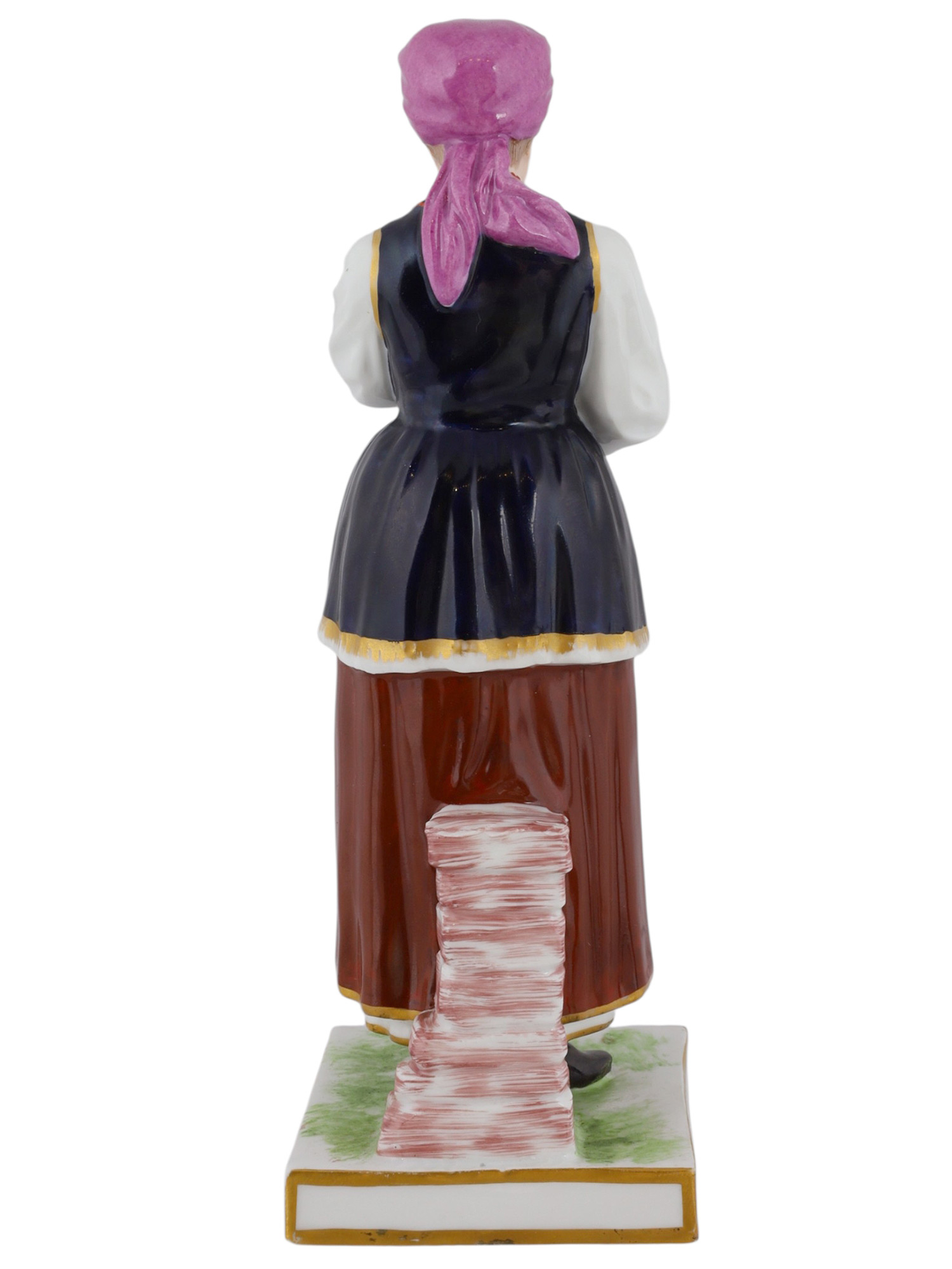 A RUSSIAN POPOV PORCELAIN FIGURE OF A UKRAINIAN WOMAN