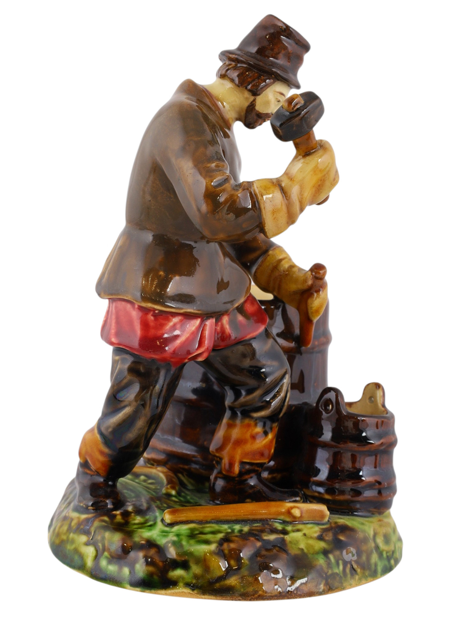 A RUSSIAN KUSNETSOV PORCELAIN FIGURE OF A COOPER, 19TH CENTURY