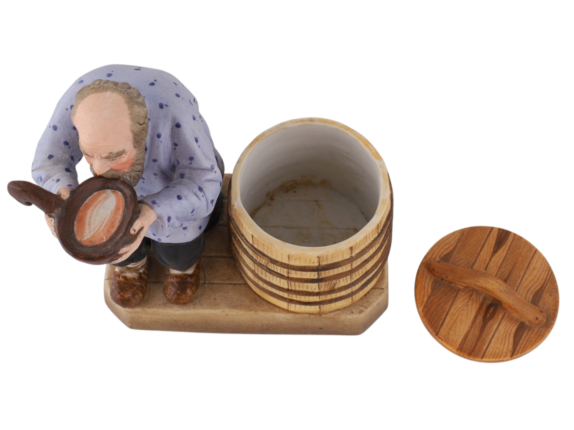 A SOVIET VERBILKI PORCELAIN FIGURAL COVERED SALT CELLAR, "THE PEASANT DRINKING FROM A KOVSH"