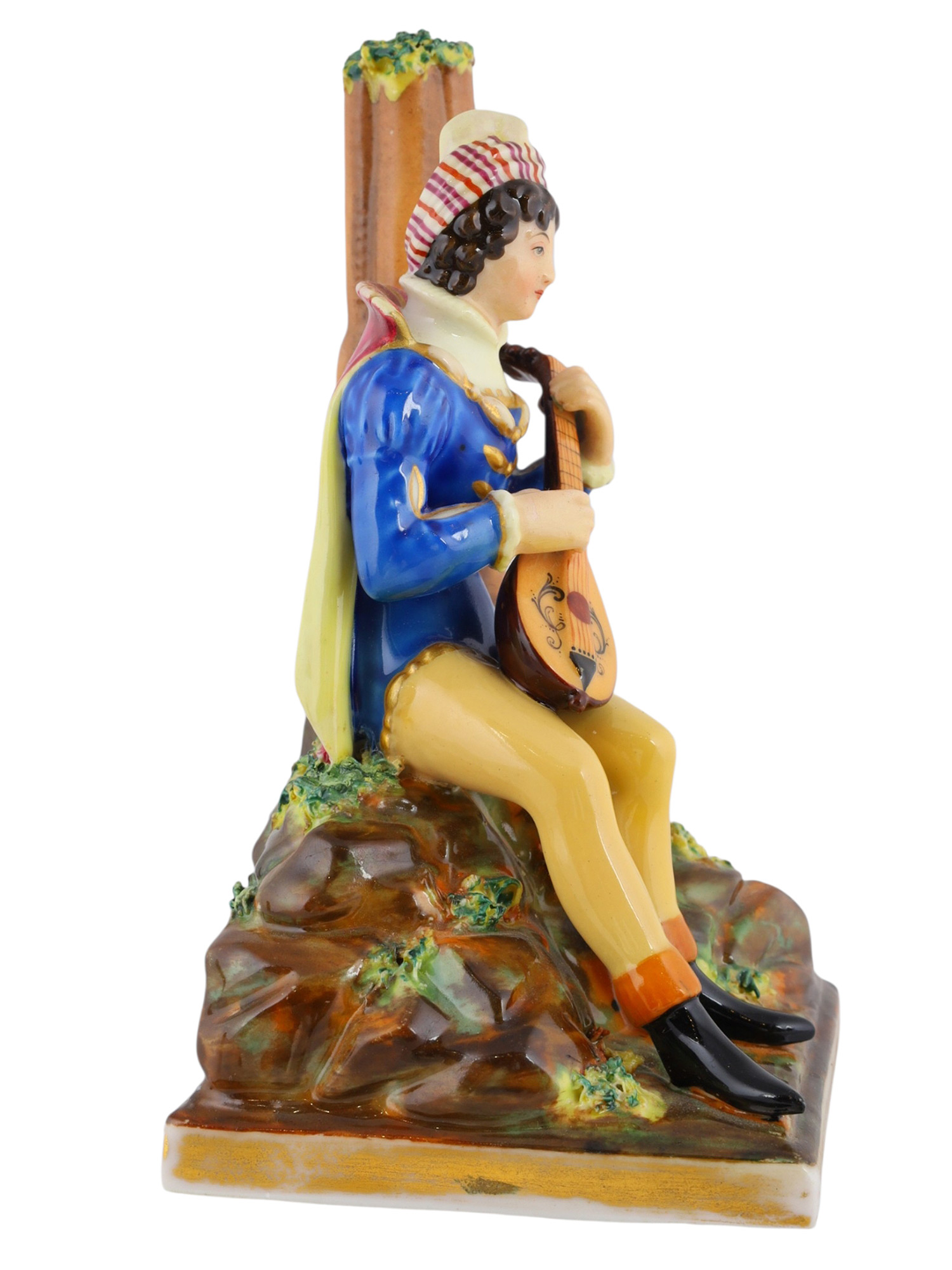 A RUSSIAN PORCELAIN FIGURE OF A MUSICIAN, POPOV FACTORY, C. 1860