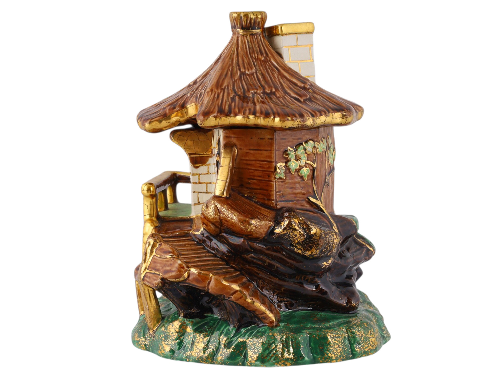 A RUSSIAN KUZNETSOV POLYCHROME AND GILT FAIENCE HOUSE-FORM COVERED TOBACCO BOX