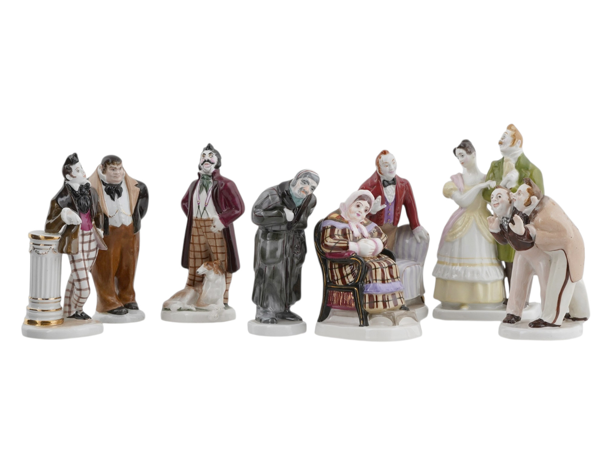 A GROUP OF EIGHT SOVIET PORCELAIN FIGURINES BASED ON NIKOLAI GOGOL’S NOVEL DEAD SOULS AND COMEDY THE GOVERNMENT INSPECTOR