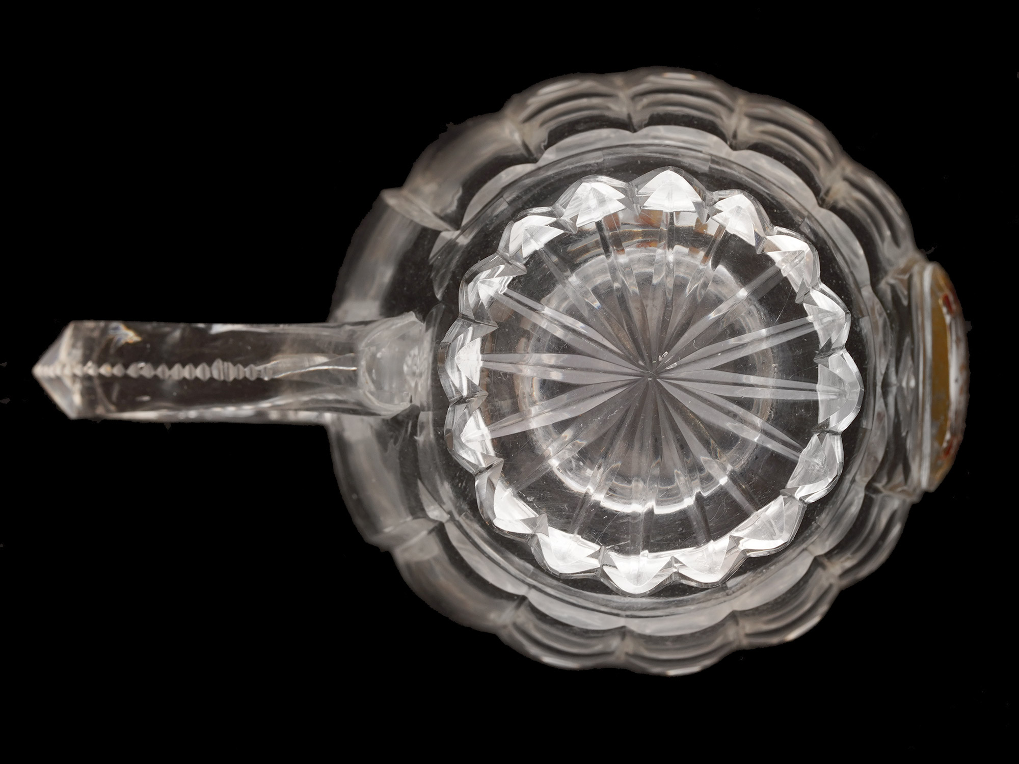 AN IMPERIAL RUSSIAN CUT-GLASS HANDLED CUP FROM A BANQUET SERVICE IMPERIAL GLASS FACTORY, ST PETERSBURG, CIRCA 1850S