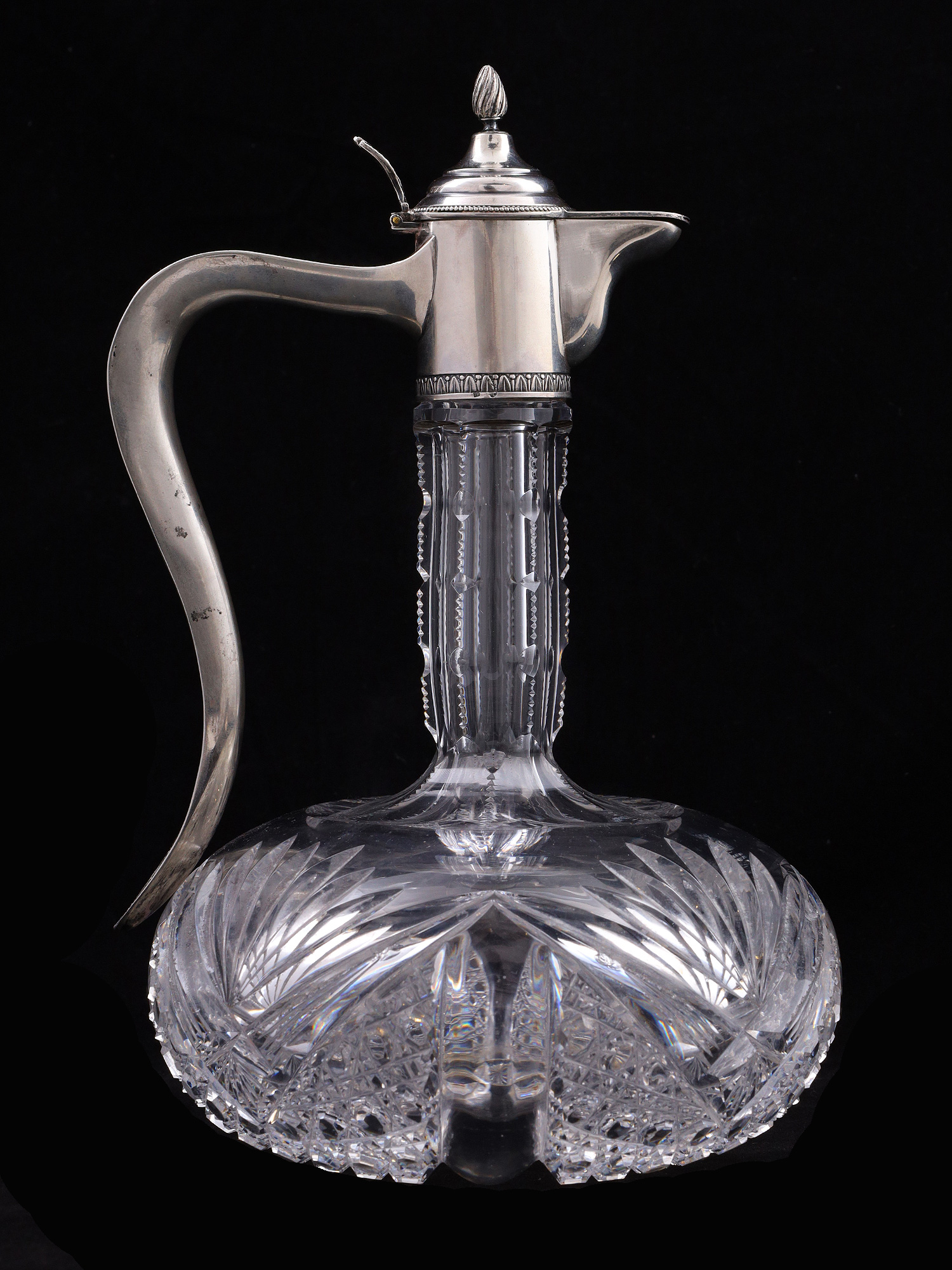 A RUSSIAN CUT-GLASS SILVER-MOUNTED EWER, 1908-17