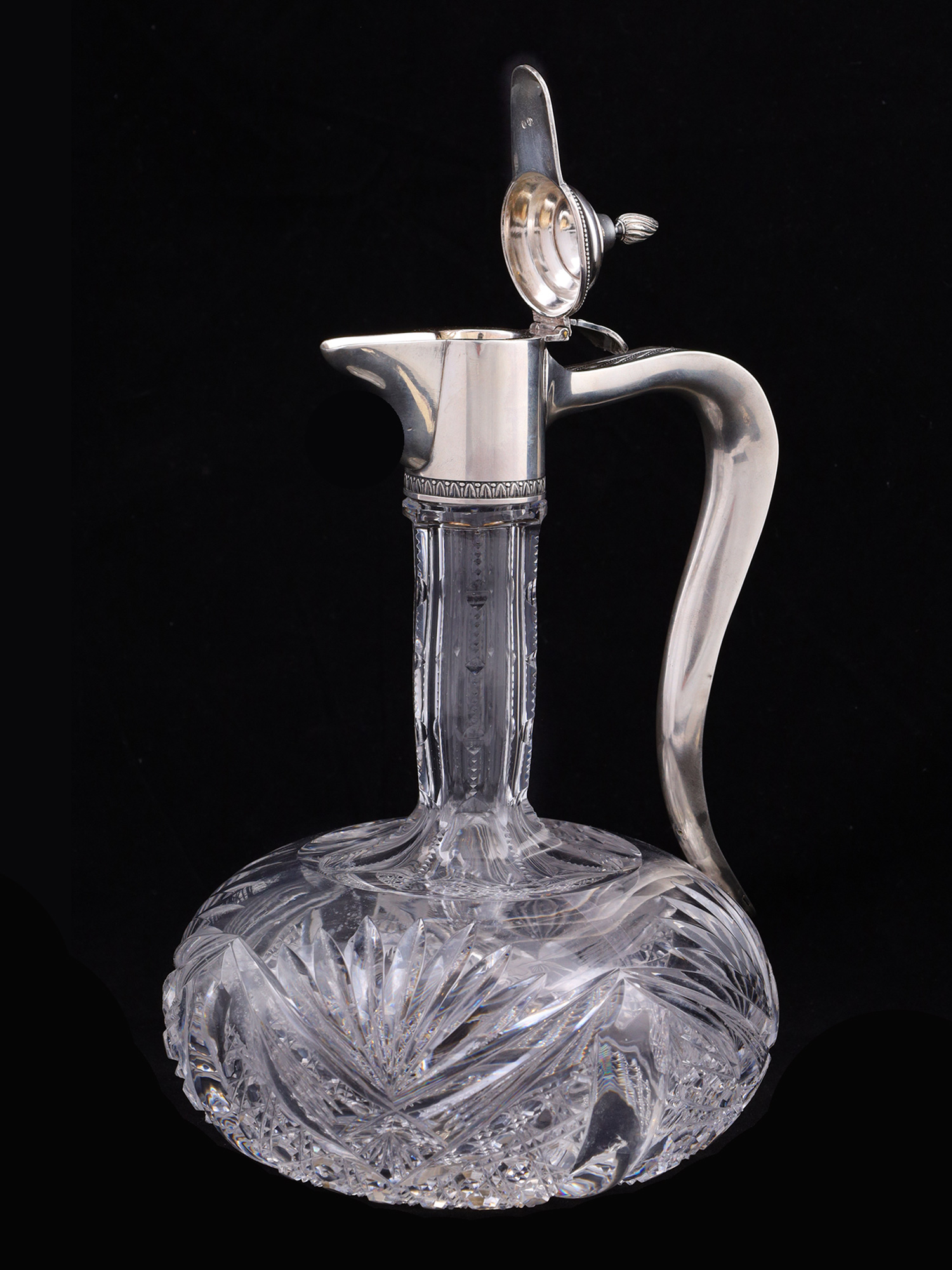 A RUSSIAN CUT-GLASS SILVER-MOUNTED EWER, 1908-17