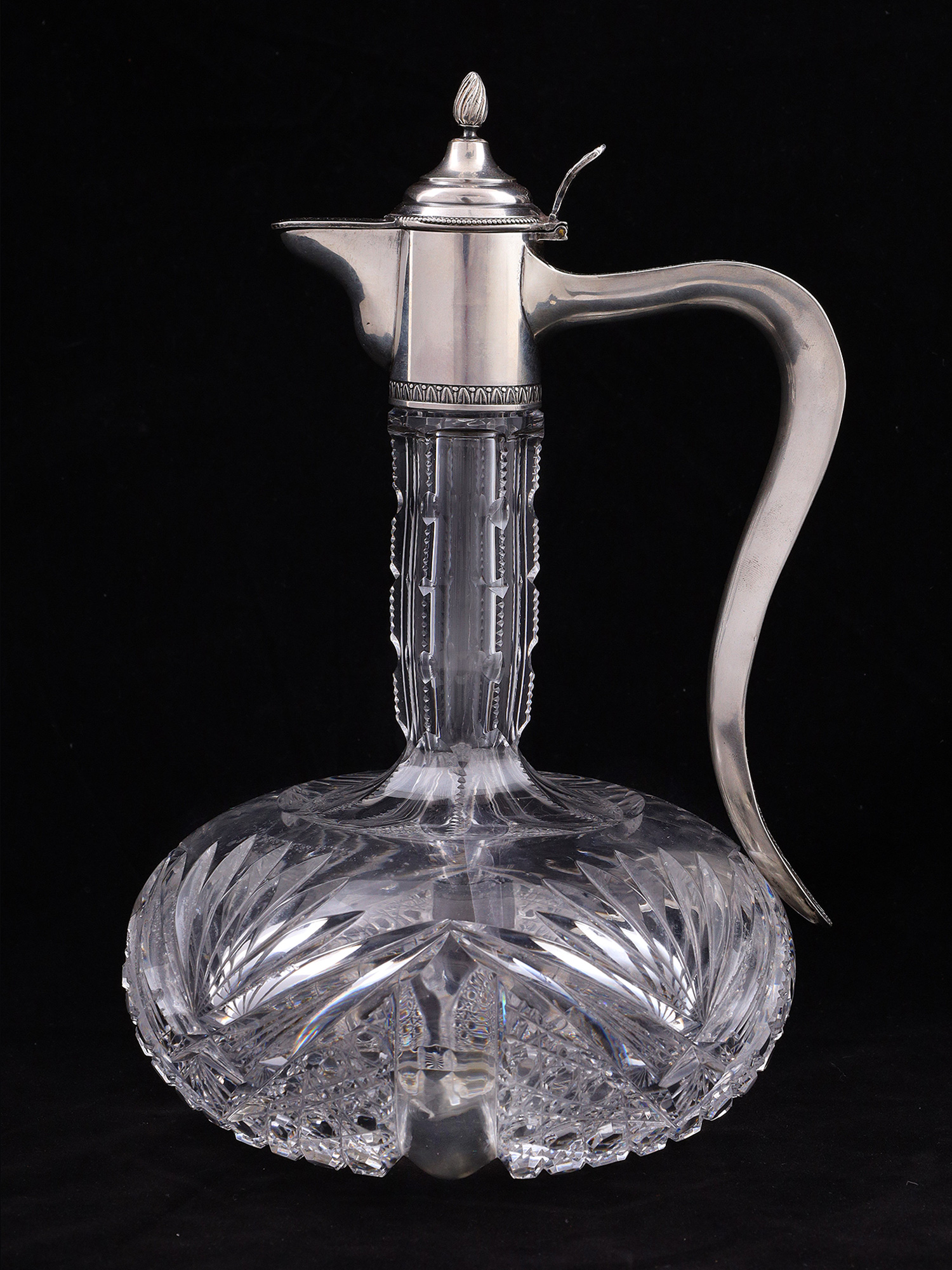 A RUSSIAN CUT-GLASS SILVER-MOUNTED EWER, 1908-17