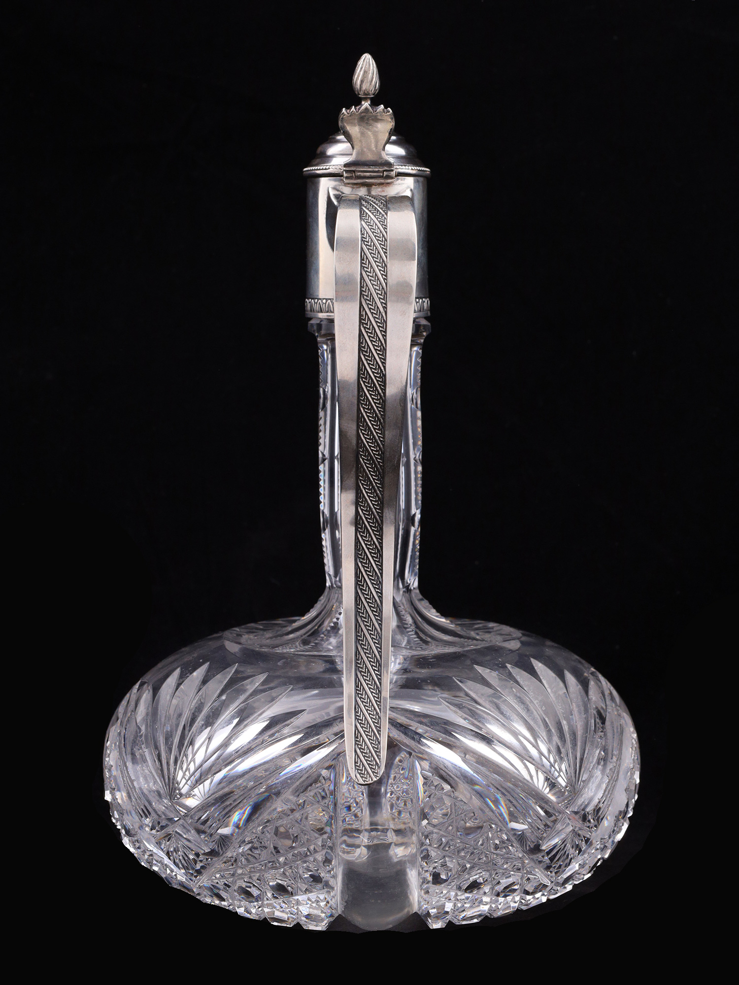 A RUSSIAN CUT-GLASS SILVER-MOUNTED EWER, 1908-17