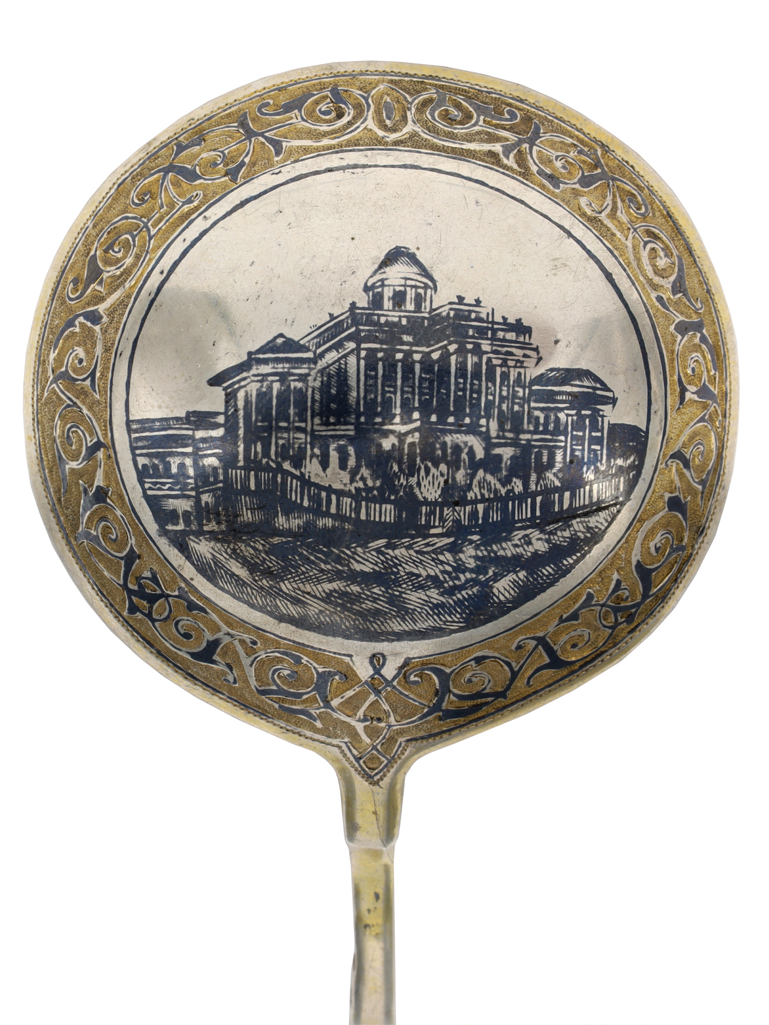 A RUSSIAN SILVER SPOON WITH NIELLO ENAMEL ARCHITECTURAL SCENE, 1875