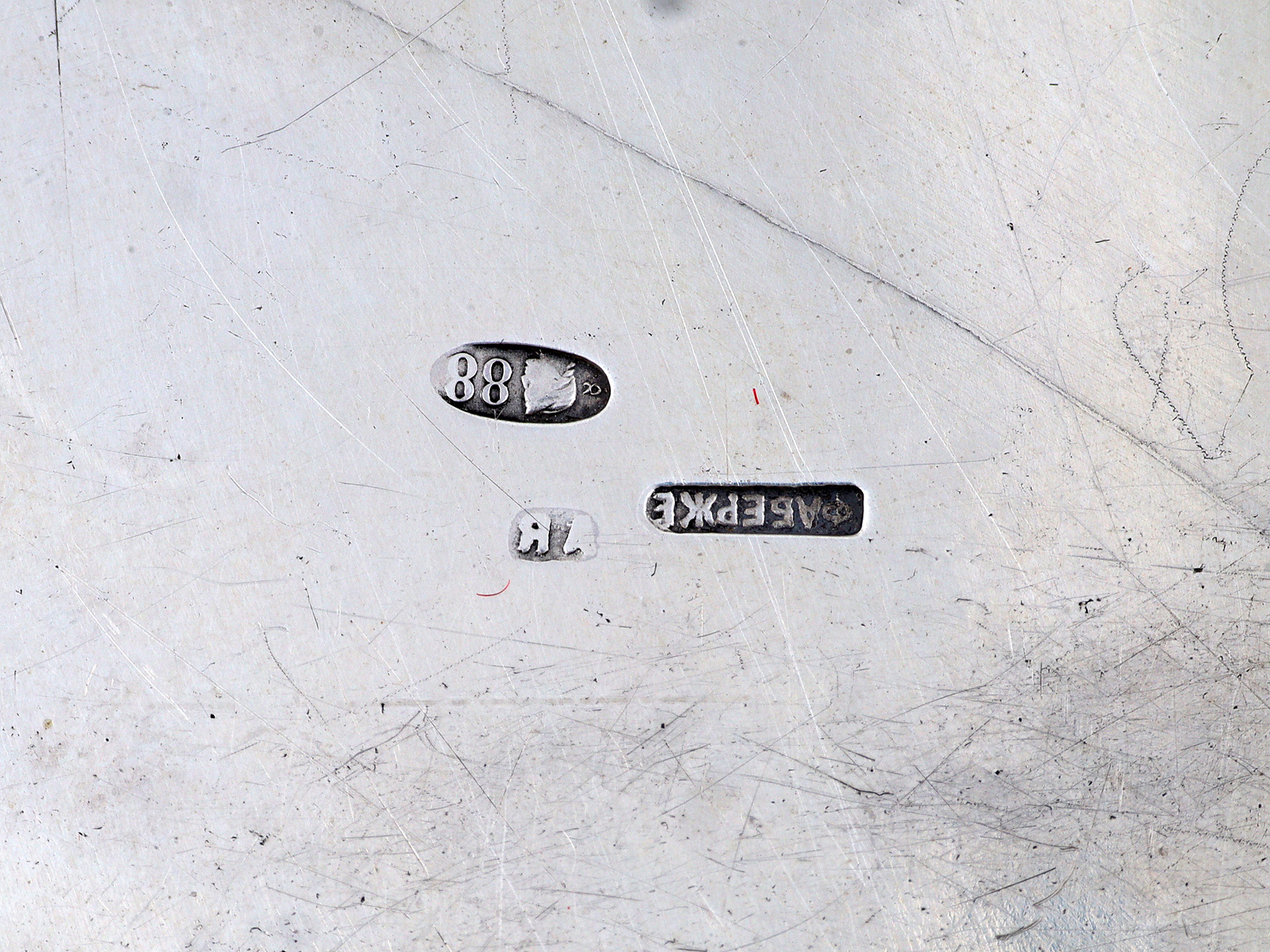 A FABERGÉ SILVER CALLING-CARD TRAY, WORKMASTER HJALMAR ARMFELT, ST PETERSBURG, 1908–1917