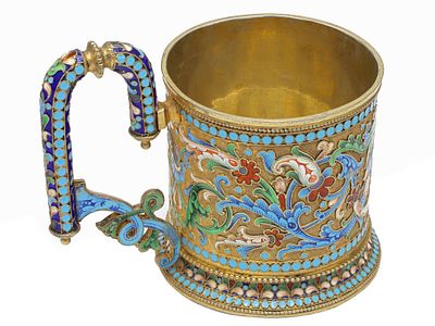 A RUSSIAN PARCEL-GILT SILVER AND CLOISONN&Eacute; ENAMEL PRESENTATION TEA GLASS HOLDER. Of cylindrical 