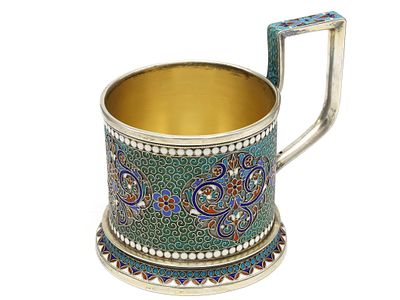 A RUSSIAN PARCEL-GILT SILVER AND CLOISONN&Eacute; ENAMEL TEA GLASS HOLDER BY GUSTAV KLINGERT, 1895. Mosc 