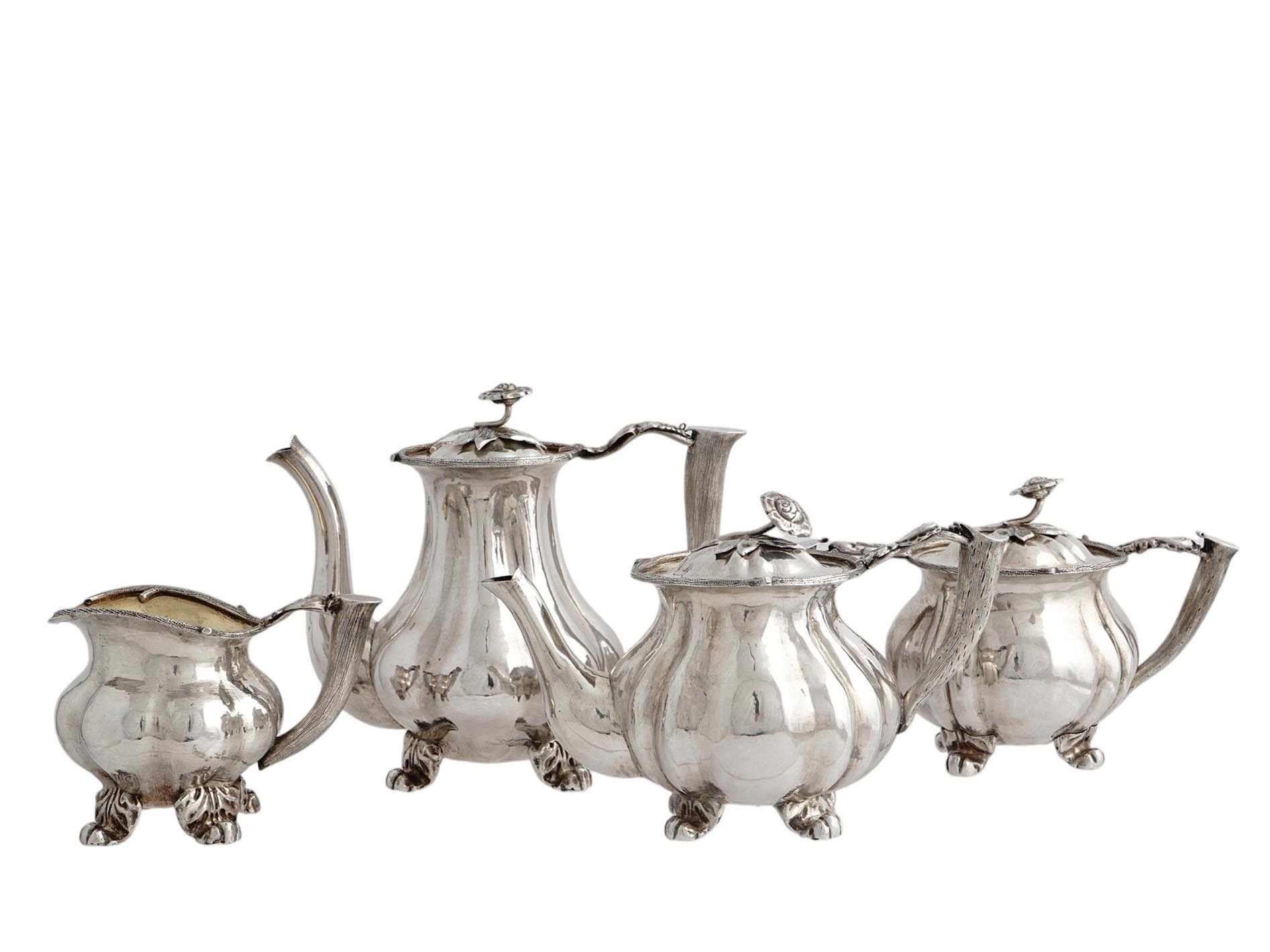 A RUSSIANPARCEL-GILT-SILVER TEA AND COFFEE SERVICE, 19TH CENTURY