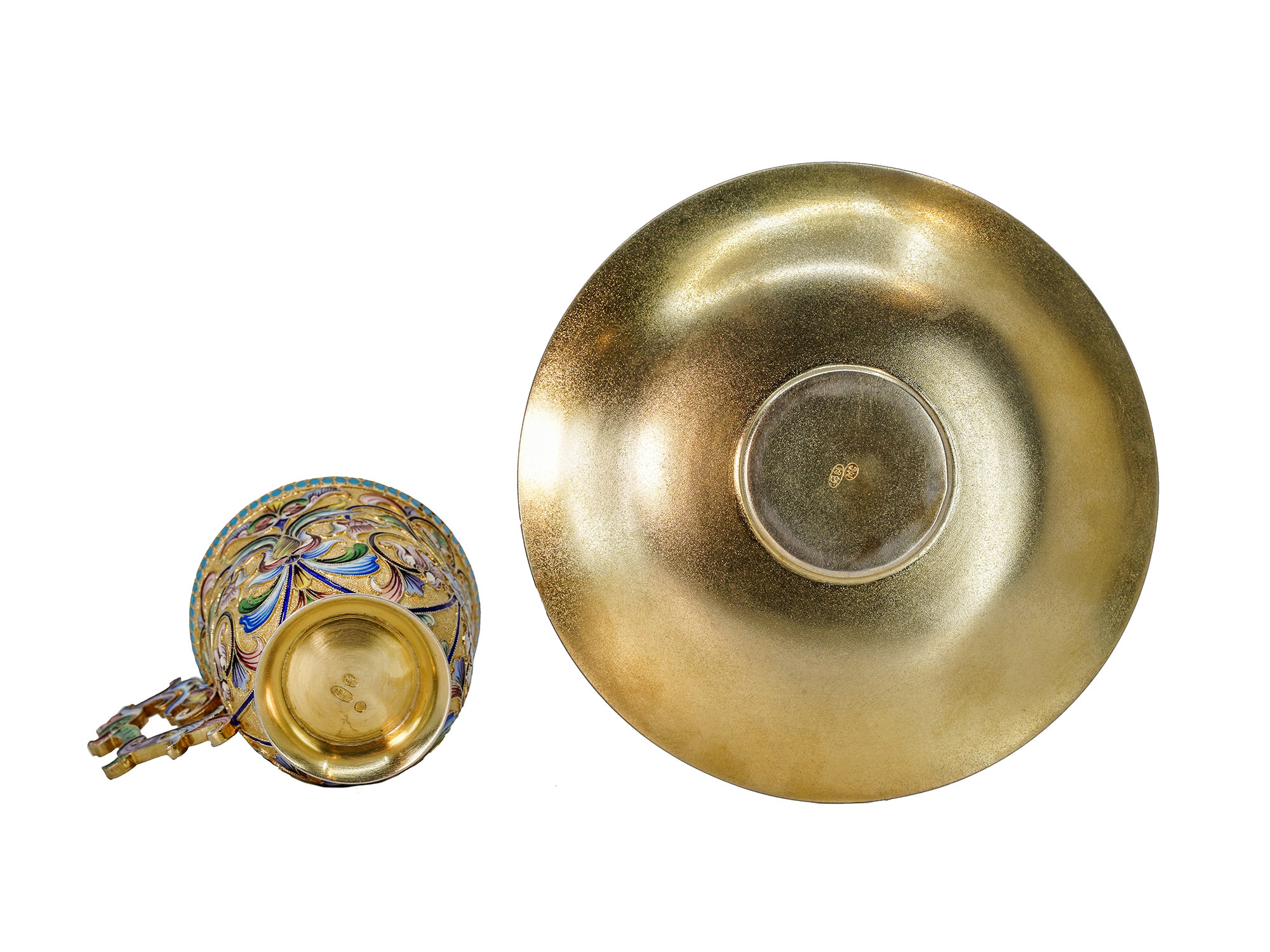 A RUSSIAN SILVER & CLOISONNE ENAMEL CUP AND SAUCER BY M. SEMENOVA, 1908-17