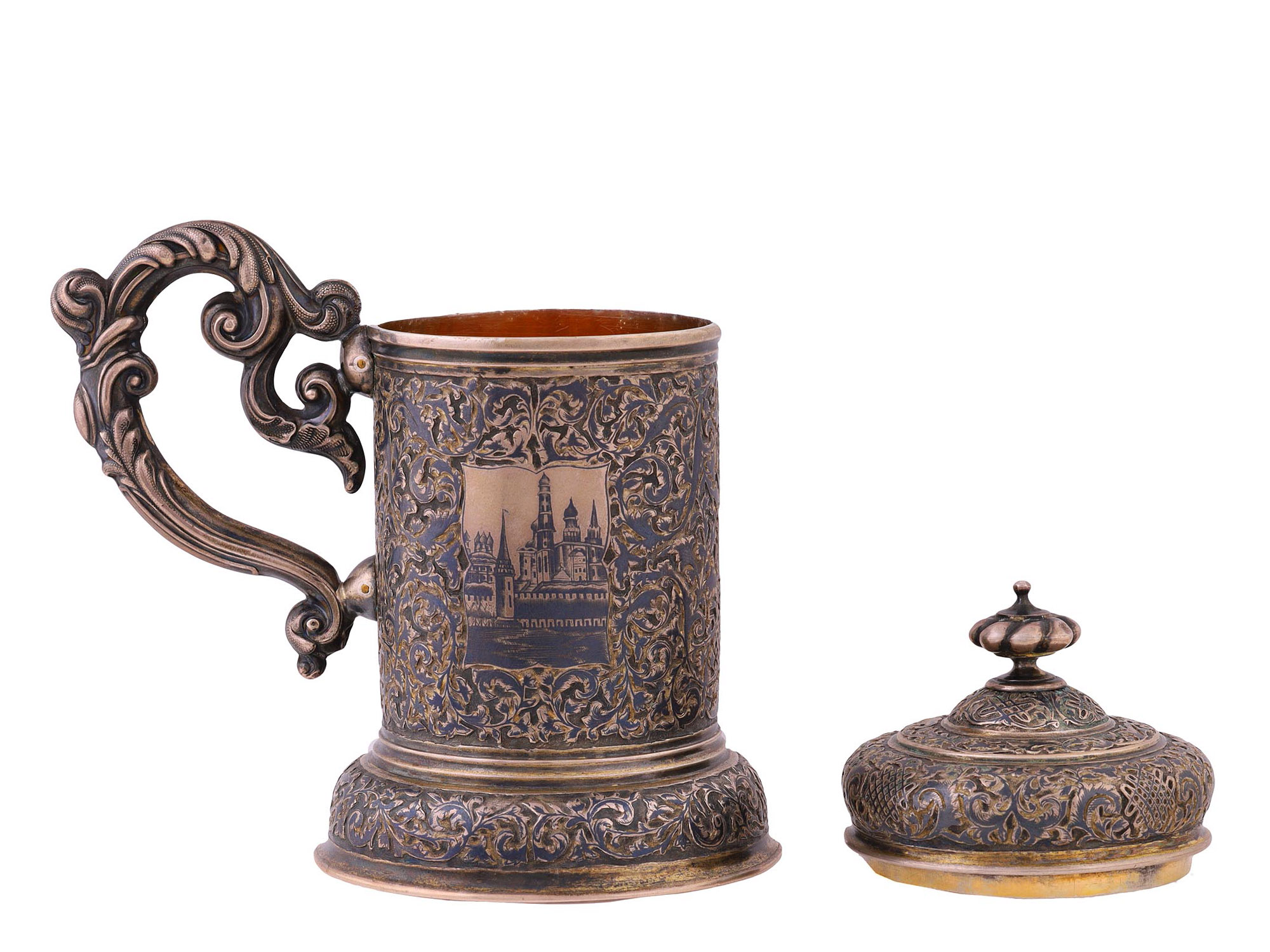 A RUSSIAN ENGRAVED GILT-SILVER AND NIELLO LIDDED TANKARD, 1850