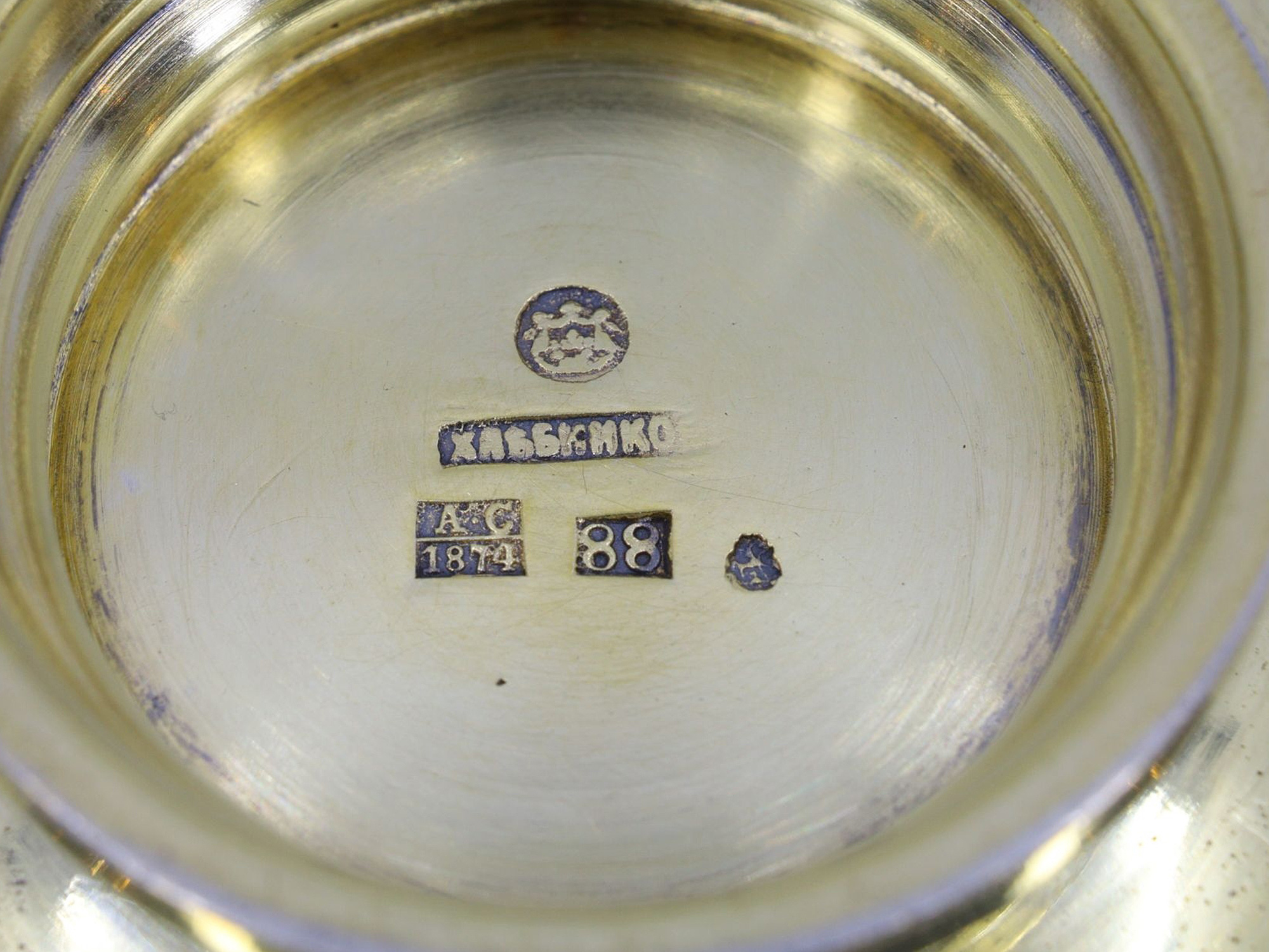 A RUSSIAN GILT-SILVER CLOISONNÉ ENAMEL CHARKA, KHLEBNIKOV, 1874