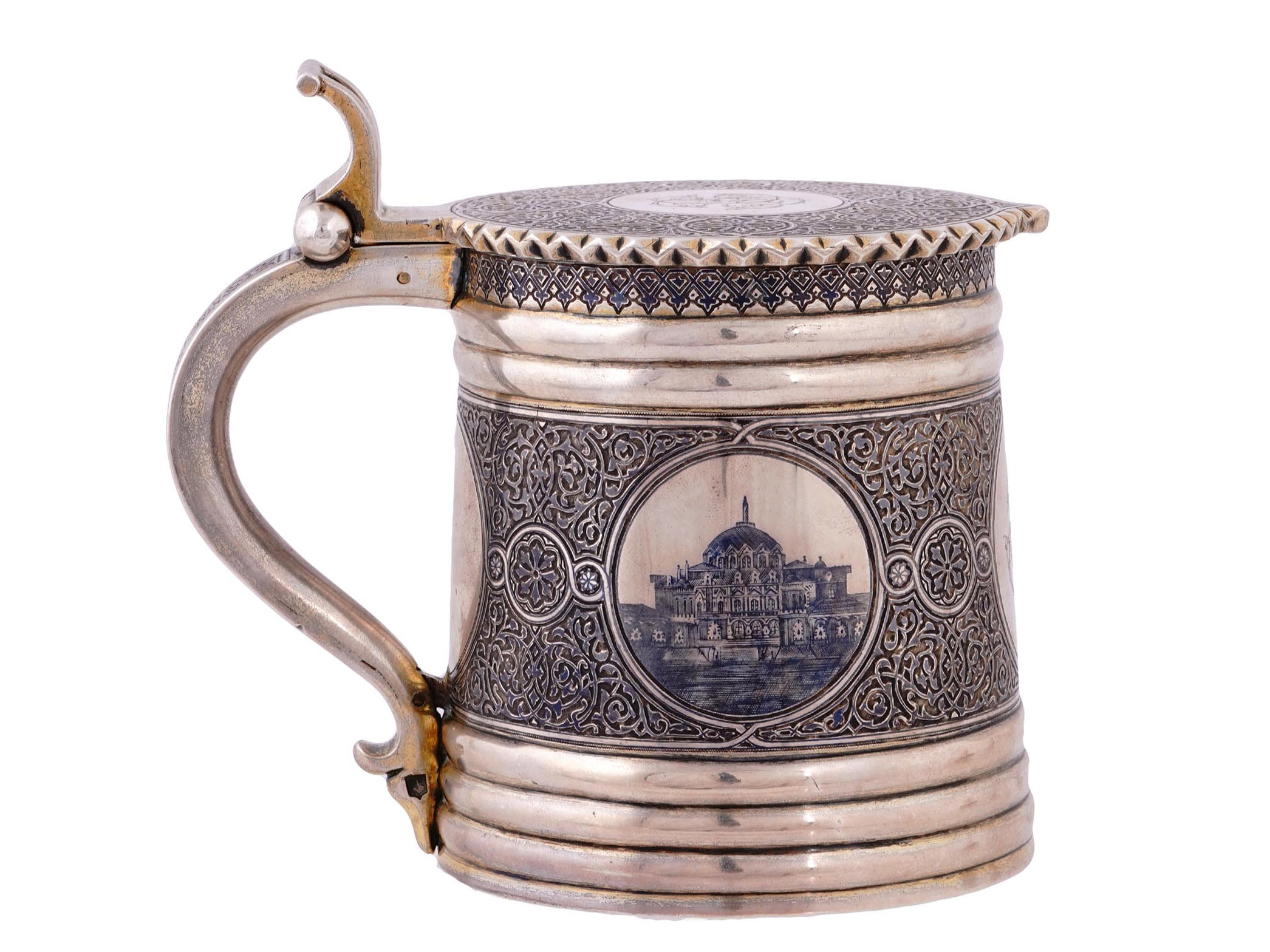 A RUSSIAN PARCEL-GILT-SILVER AND NIELLO LIDDED TANKARD, OVCHINNIKOV, 1878