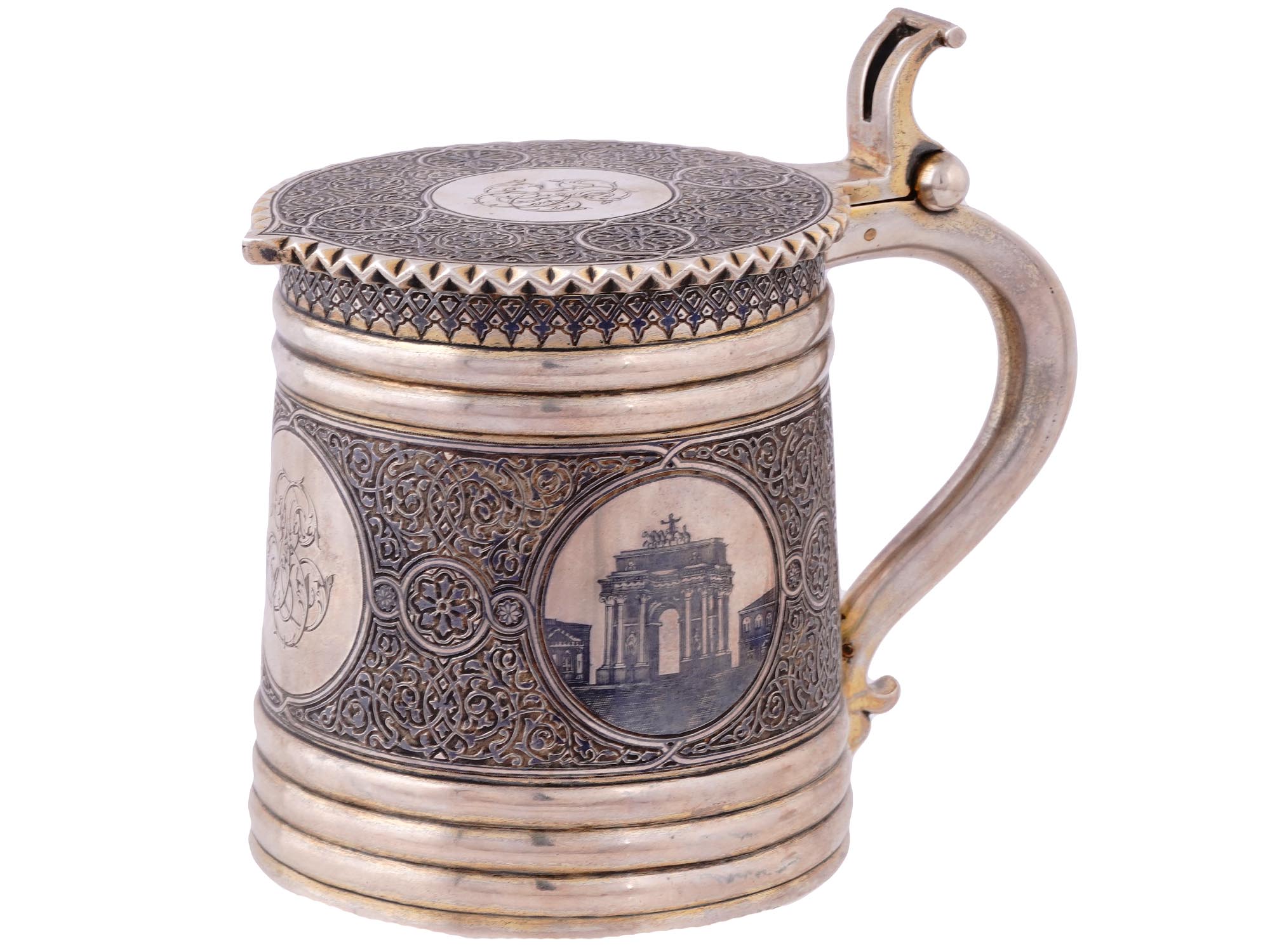 A RUSSIAN PARCEL-GILT-SILVER AND NIELLO LIDDED TANKARD, OVCHINNIKOV, 1878