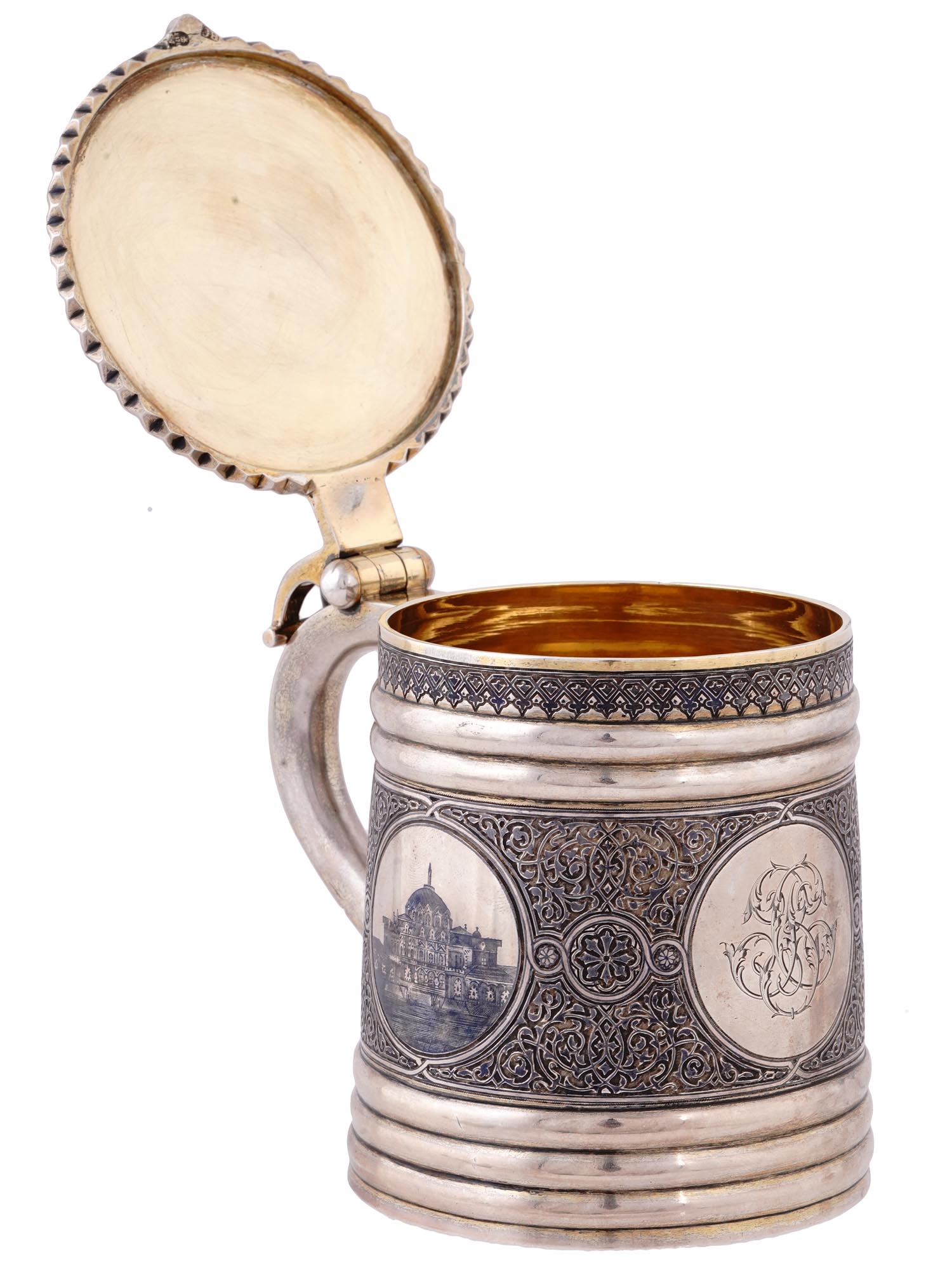 A RUSSIAN PARCEL-GILT-SILVER AND NIELLO LIDDED TANKARD, OVCHINNIKOV, 1878